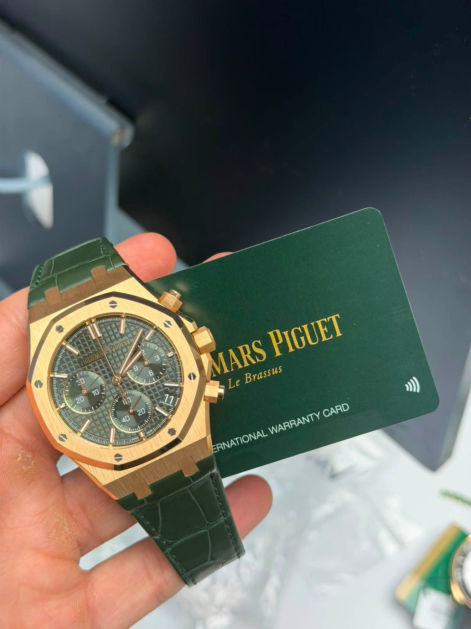 May be an image of wrist watch and text that says '18 NATT T E MARS 0 PIGUET Brassus Brassus 11 AO Mabr CARD WARRANTY ERNA ERNATIONAL IONAL'