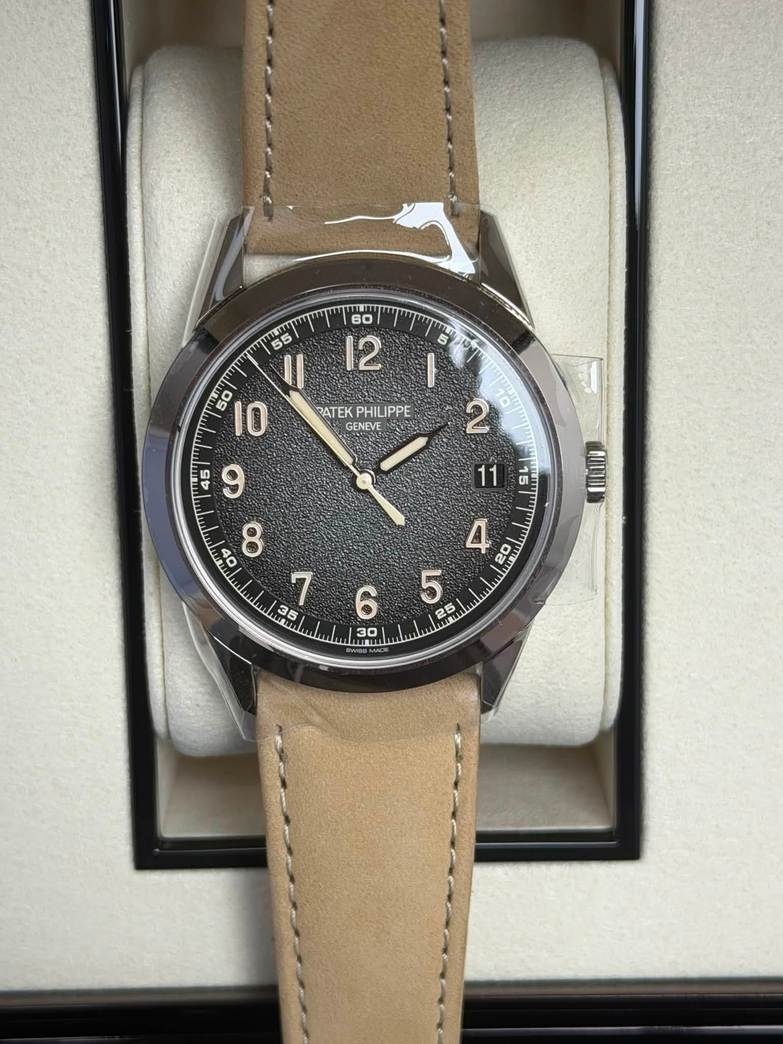 May be an image of wrist watch and text that says ' Il 50 50 IO PATEK RATEKPHILIPPE PHILIPPE GENEVE 1 46 9 O 8 1 35 កក 11 dI BUO 4 08 e '