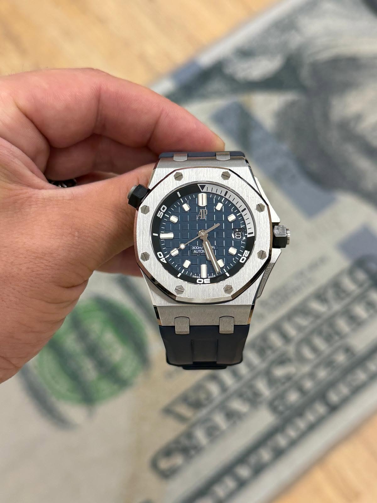 May be an image of wrist watch and text