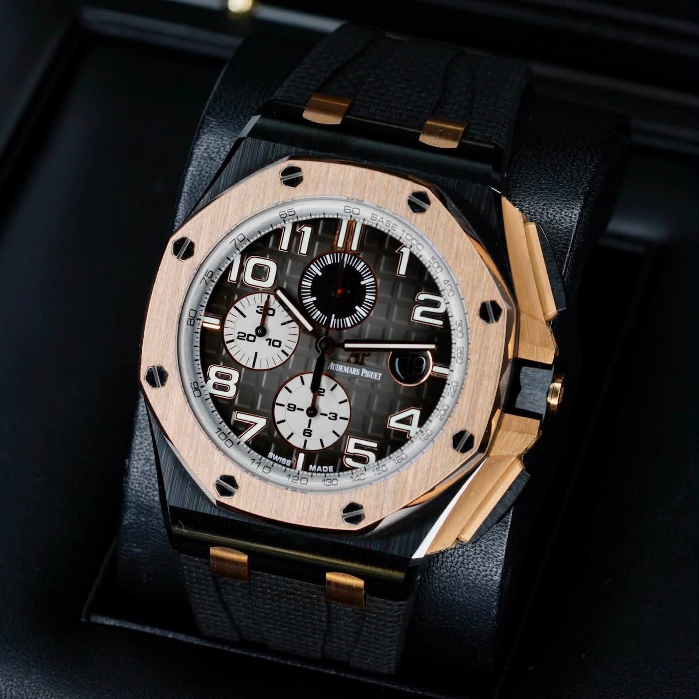 May be an image of wrist watch and text that says 'O မှခ်ိ 7 WI SHIN 60 BASE I m T 20 = 10 TTEMARS PIGUET A00 7 9- SWISS MADE P5 5 30'