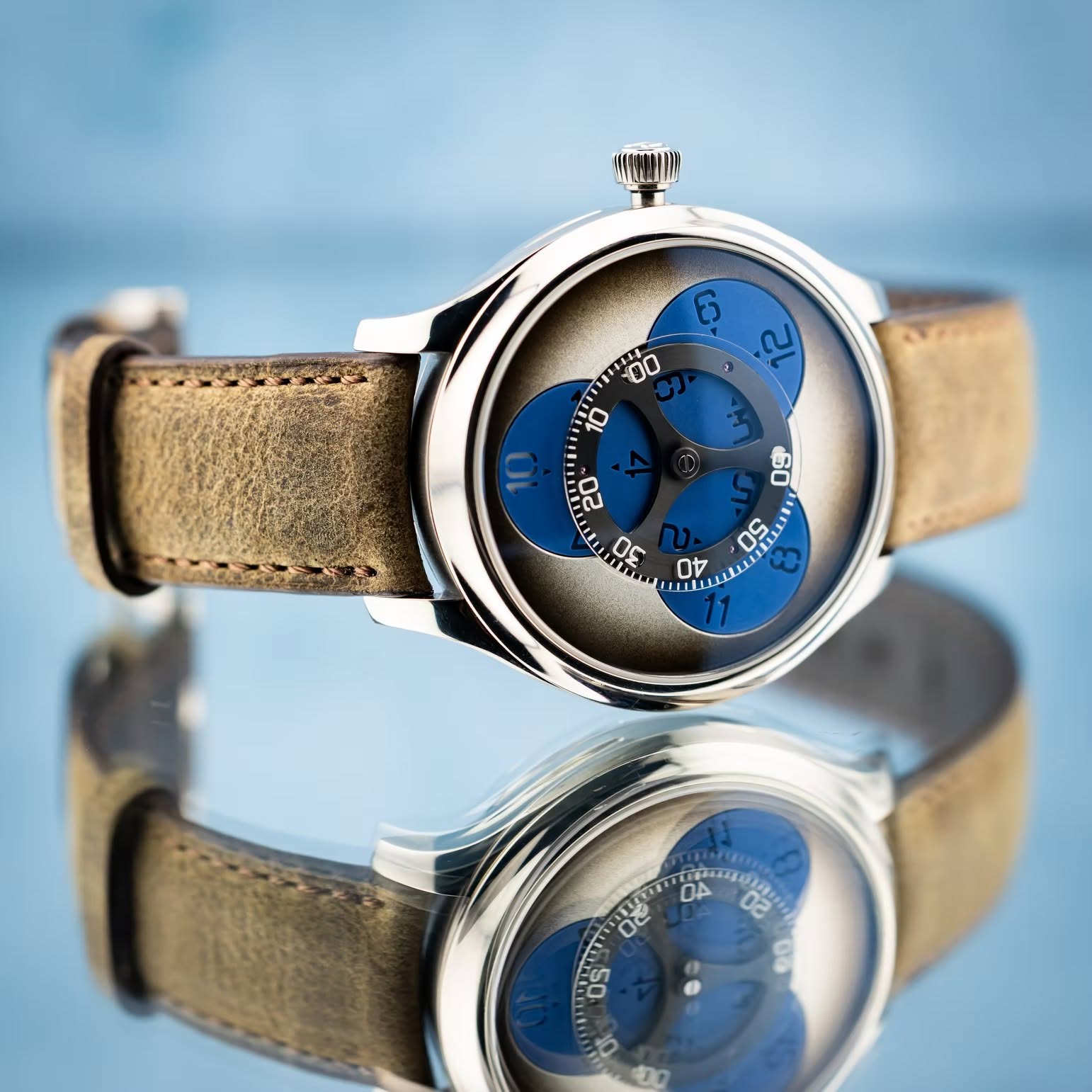 May be an image of wrist watch and text