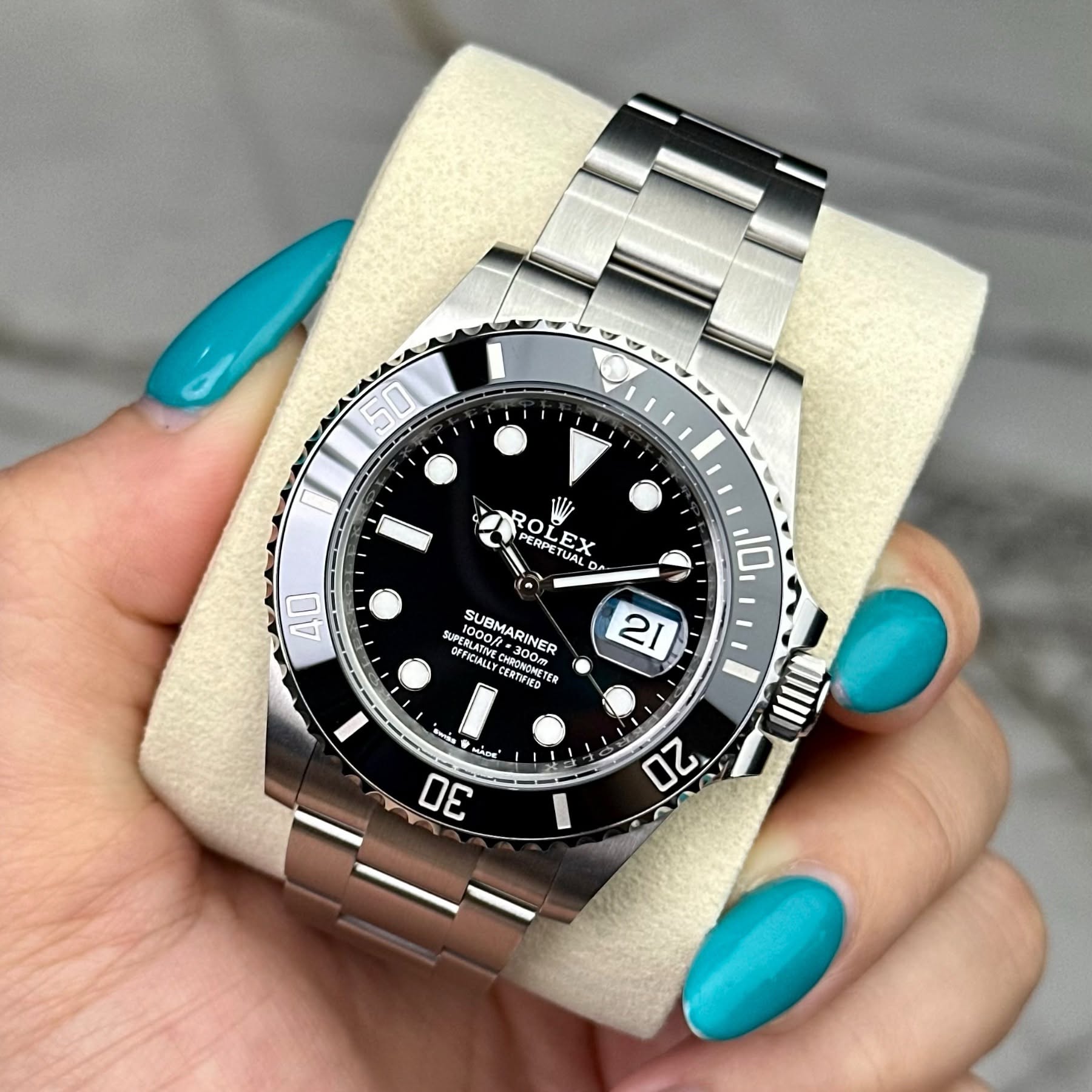 May be an image of wrist watch and text