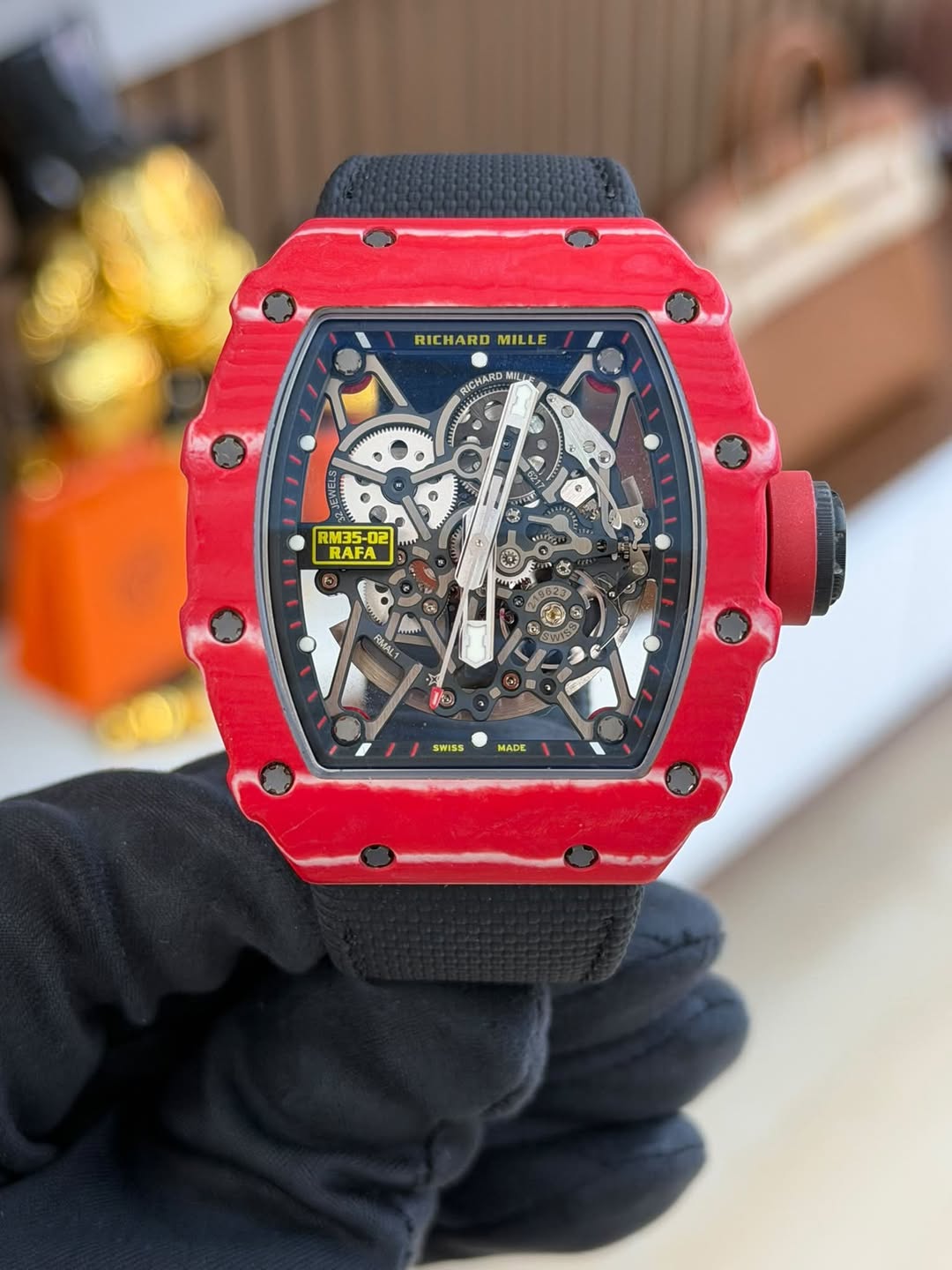 May be an image of wrist watch and text that says 'RICHARD RICHARDMILLE MILLE ICHARD NI ቢዊ HAMAA O W RM35 RM35-02 02 RAFA 5 اللسلي FMAL RW โทย lis SWISS MADE'
