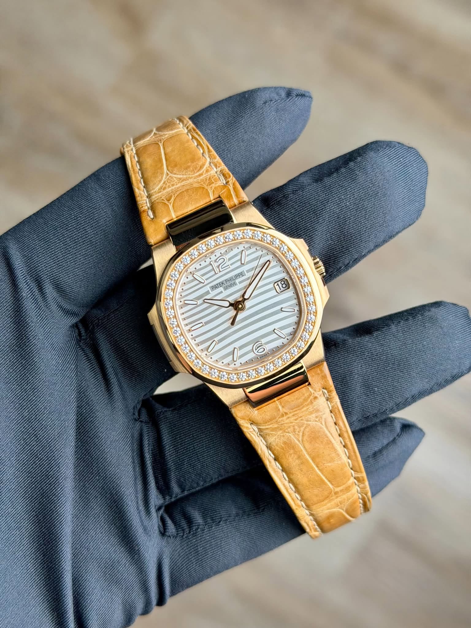 May be an image of wrist watch and text