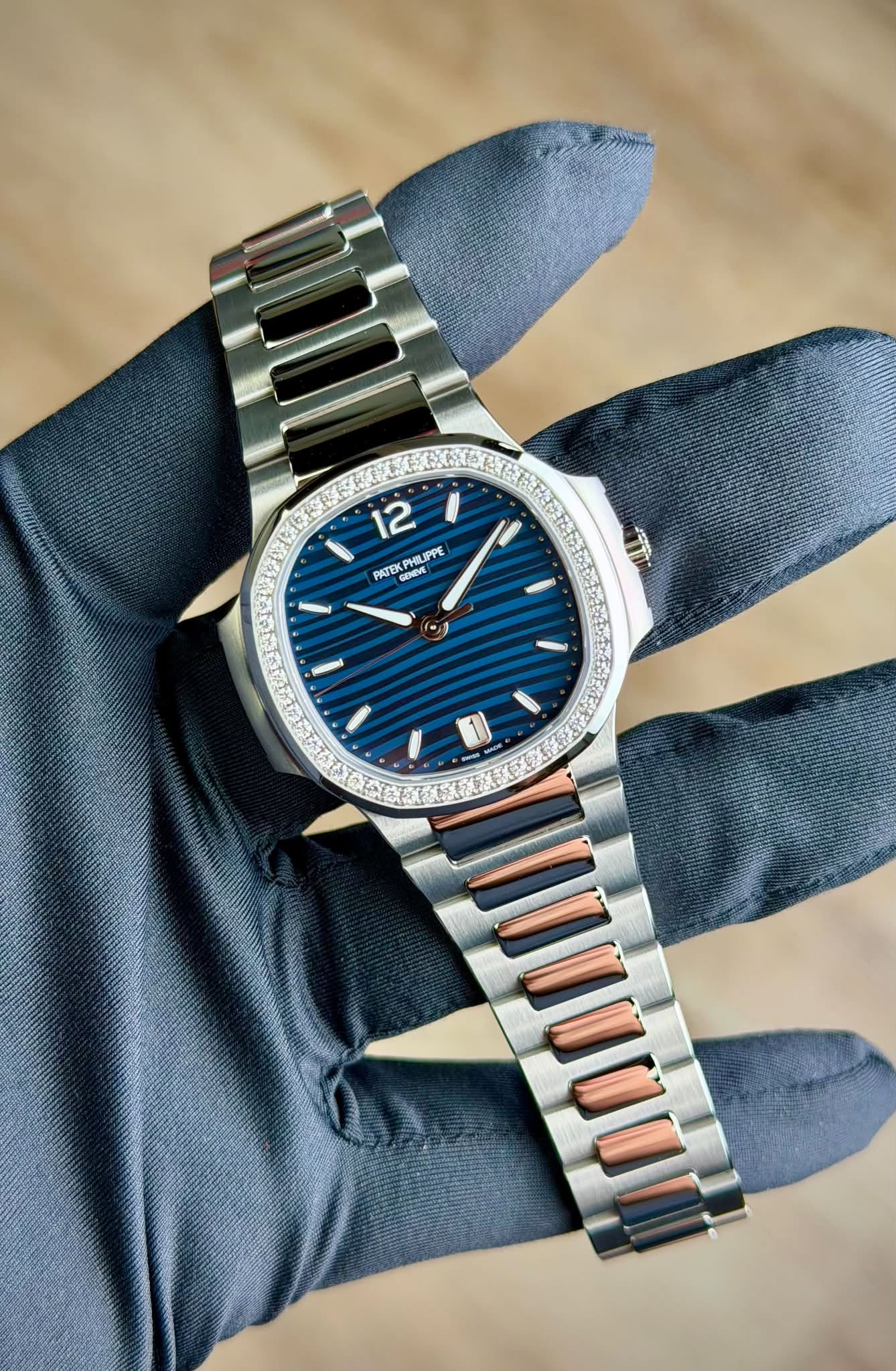 May be an image of wrist watch and text that says '12 PATEK GENEVR CENEVE PHILIPPE IPPE KPHILIP اوت'