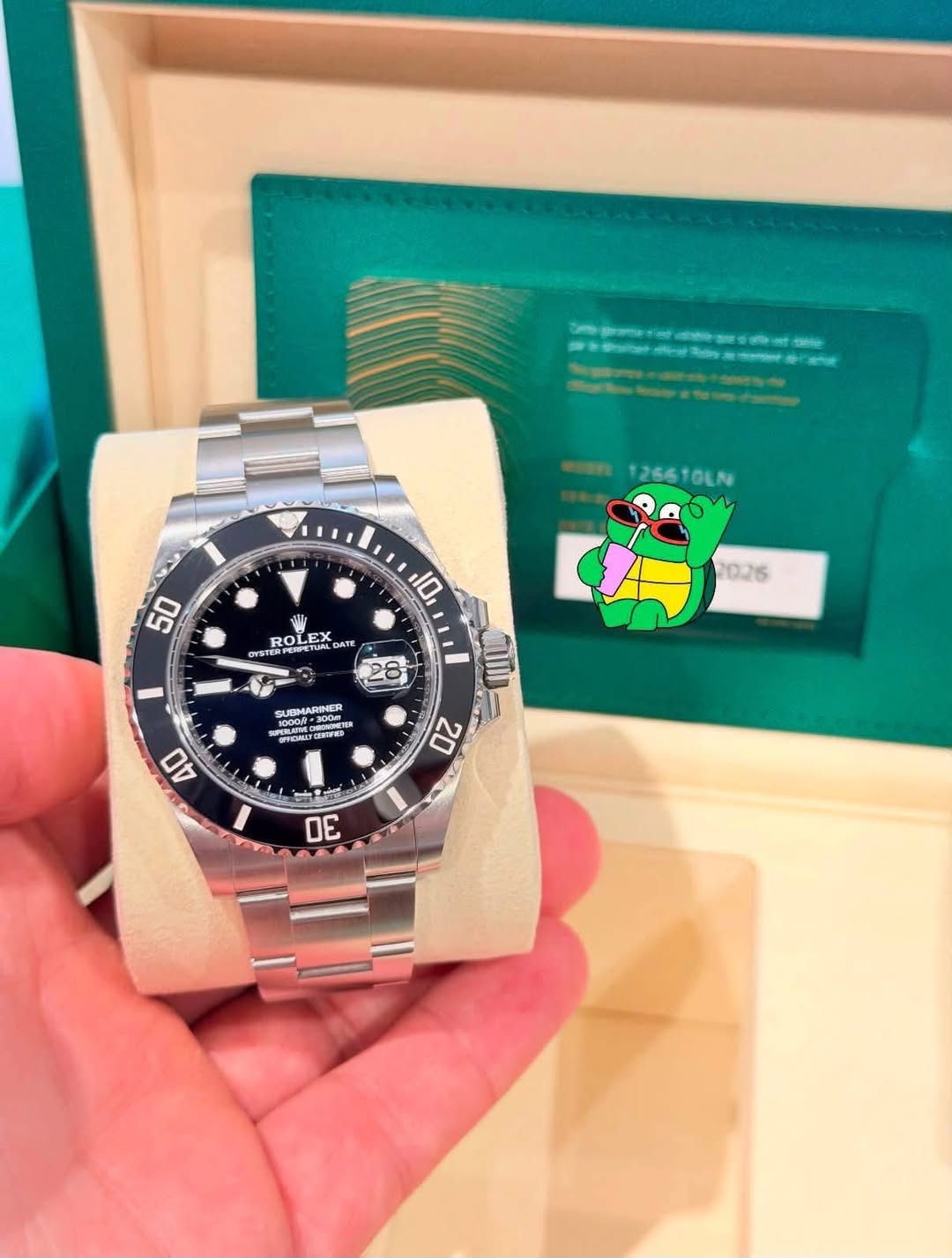 May be an image of wrist watch and text