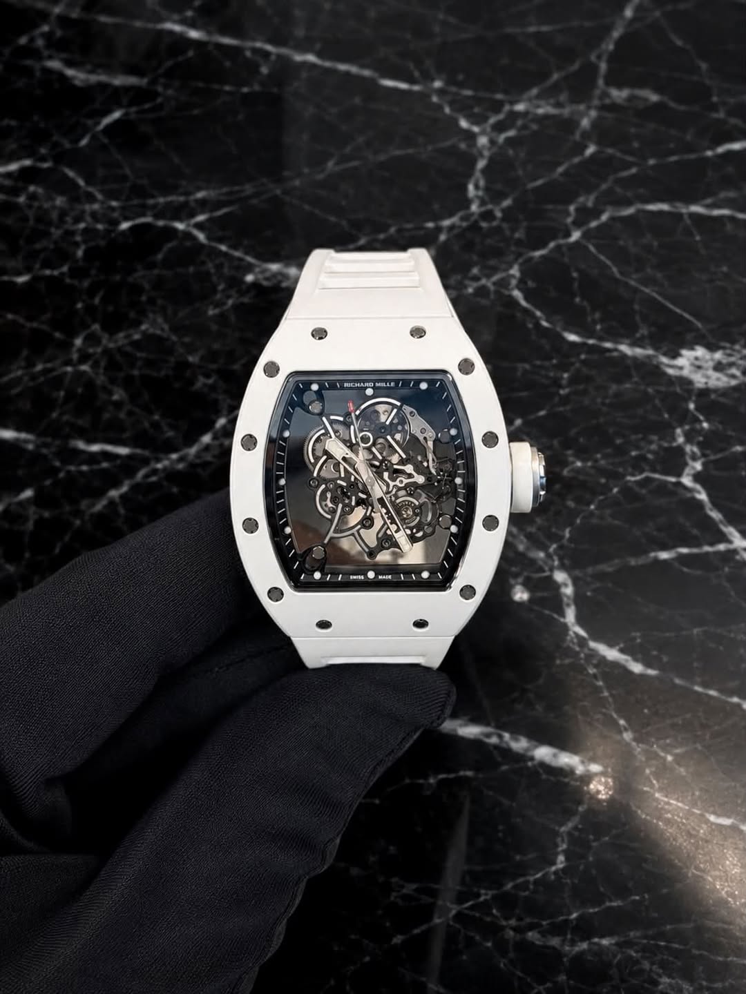 May be an image of wrist watch and text