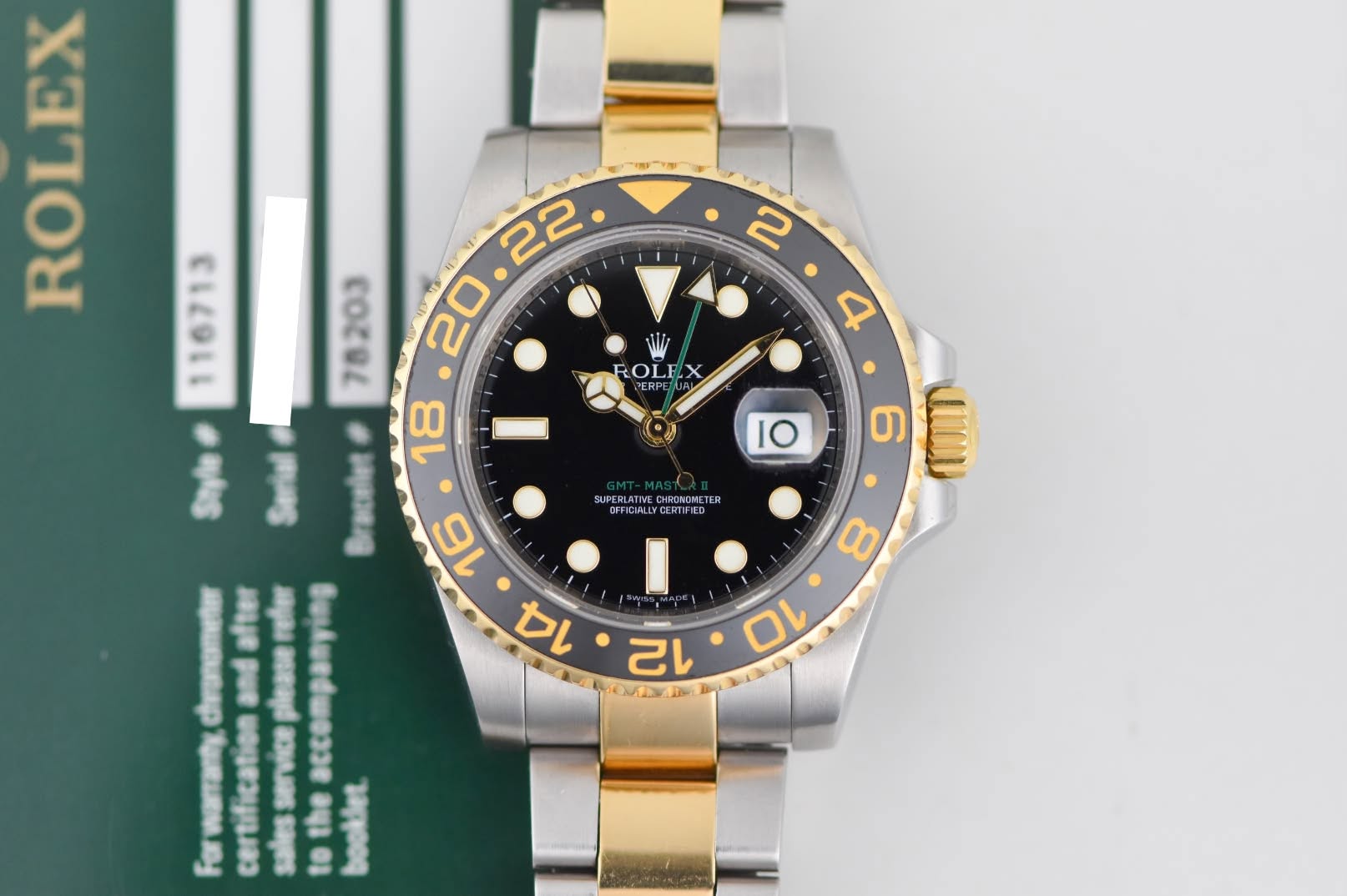 May be an image of wrist watch and text that says 'E ROLEX 116713 2 BY ROLE ERP 1O SUPERLA CHRONONE TER FRAALLCERTIF FICIALI ALLY CERTIFIE LEGERTIFIED TIFIED 6 COOI ወትን 14B'