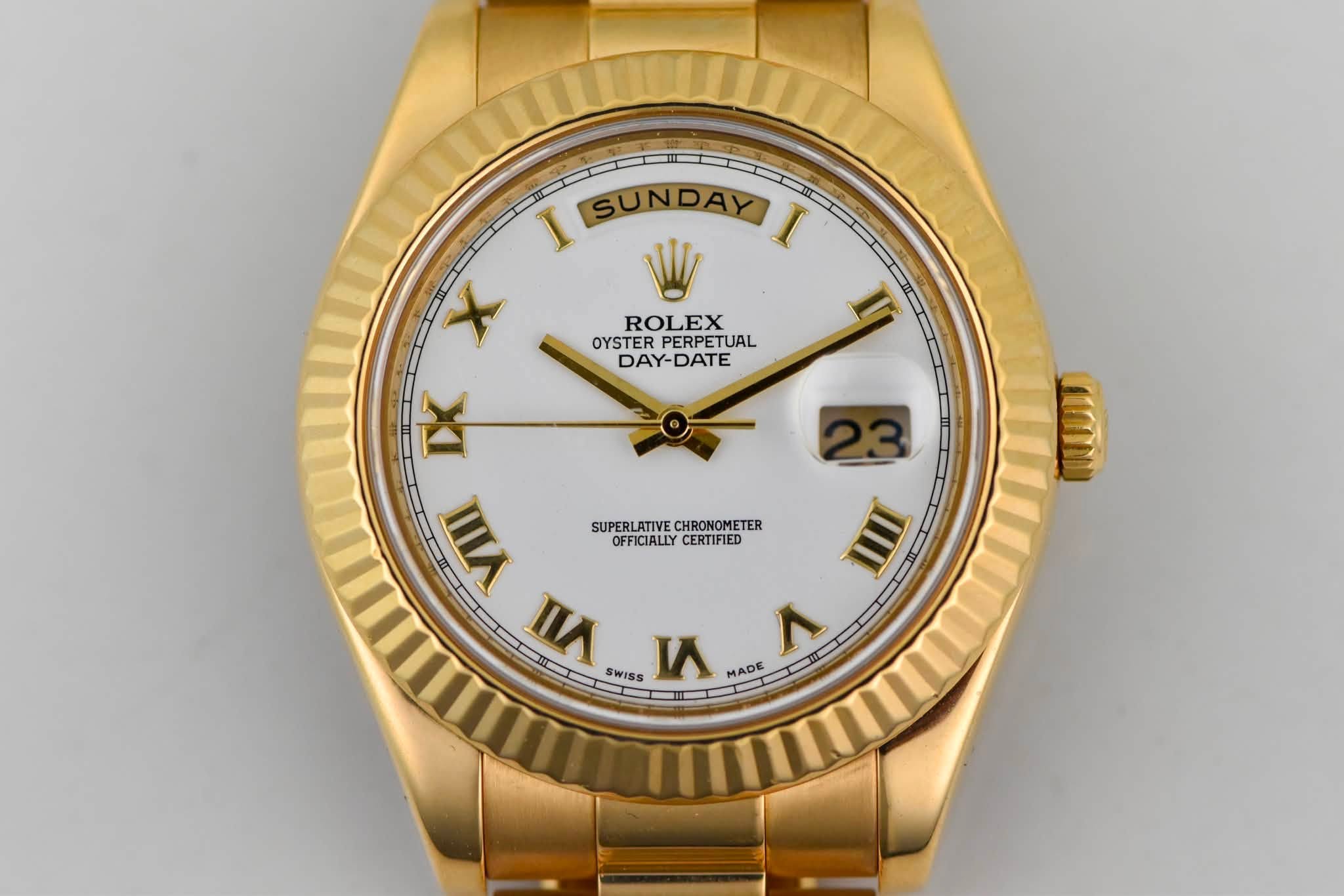 May be an image of wrist watch and text that says 'ROLEX OYSTER PERPETUAL DAY-DATE I SUNDAY SUNDAY I X I 区 WA II א SWISS u MADE 山 MADE 1 18 SUPERLATIVECHRONOMETER OFFICIALLY…