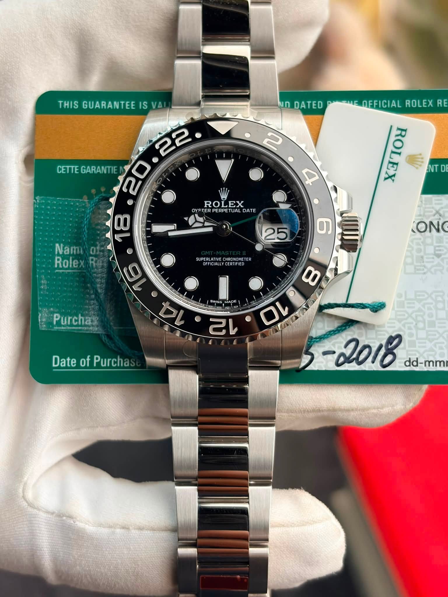 May be an image of wrist watch and text that says 'THIS GUARANTEE THISGUARANTEEISVA S SVAI IS 22 CETTE GARANTIE ROLEX RPERPETUAL DATE 18 그 n DATED ARMEOEFICIAL ROLEX…