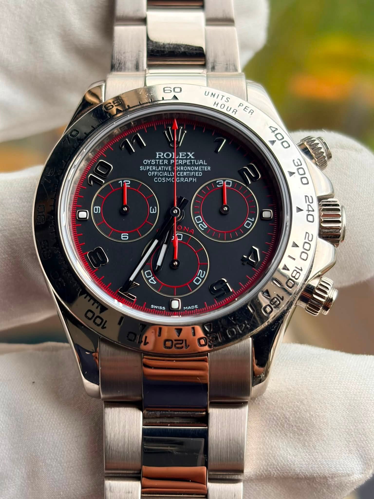 May be an image of wrist watch and text that says '60 11 ROLEX EX 10 OYSTERP TERPERPETUA PERPETUAL ETUAL SUPERLATIVE HRONOMETE OFFICIALL CERTIFIED CERTIFIED P COSMC RAPH a တ ω A…
