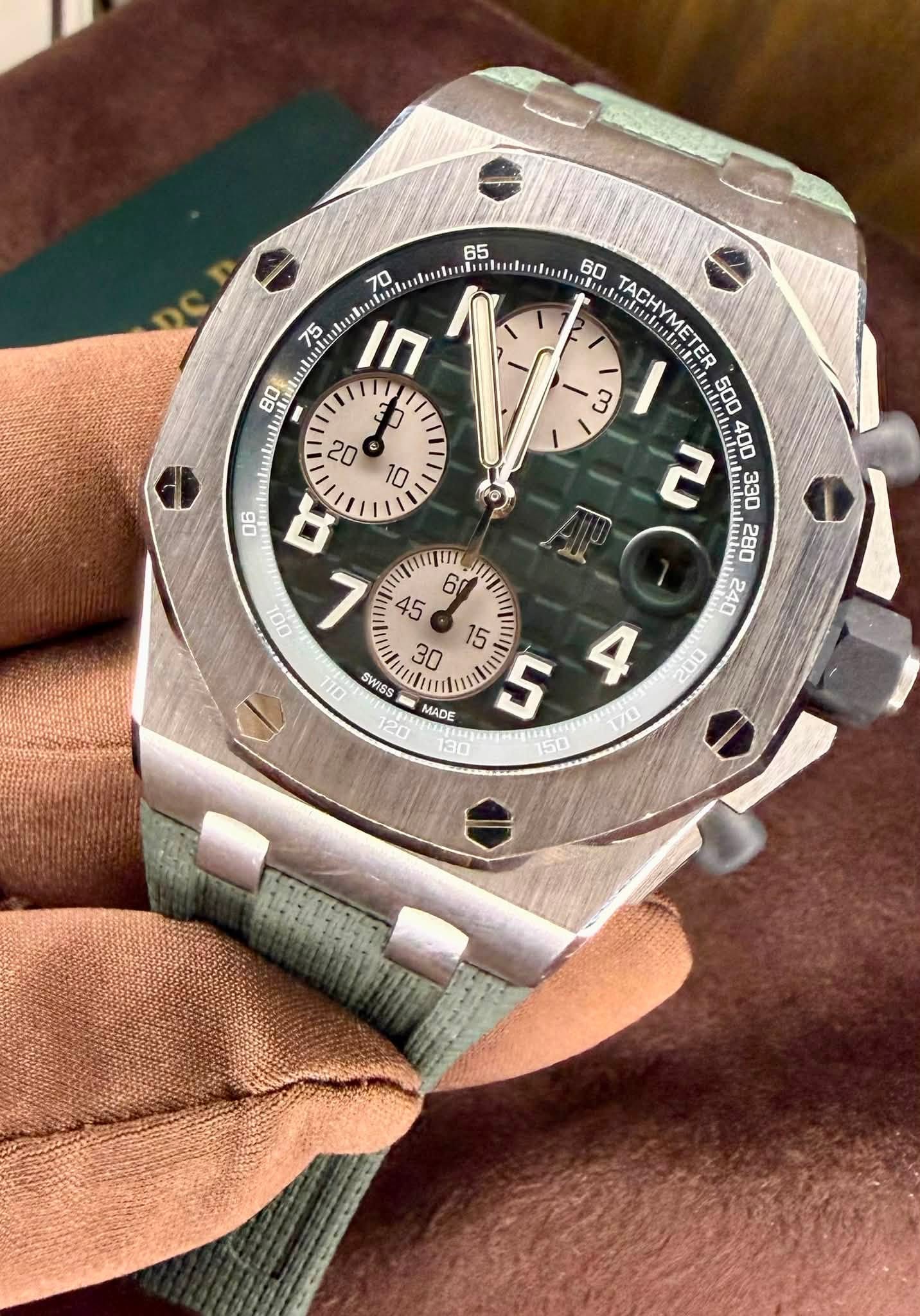 May be an image of wrist watch and text