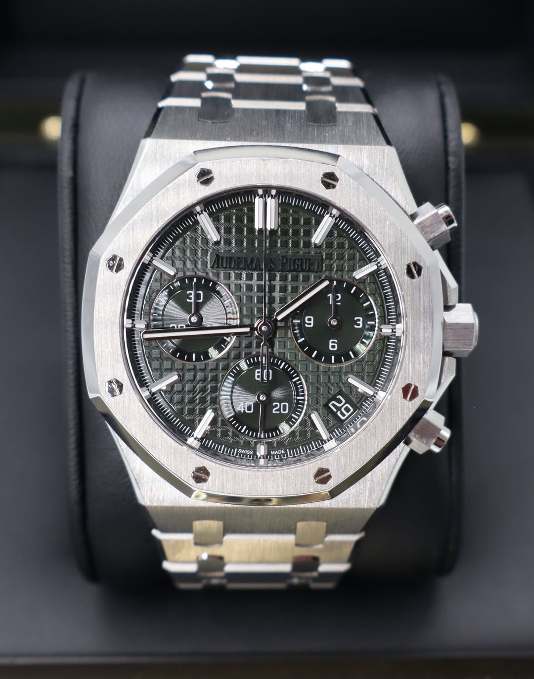 May be an image of wrist watch and text