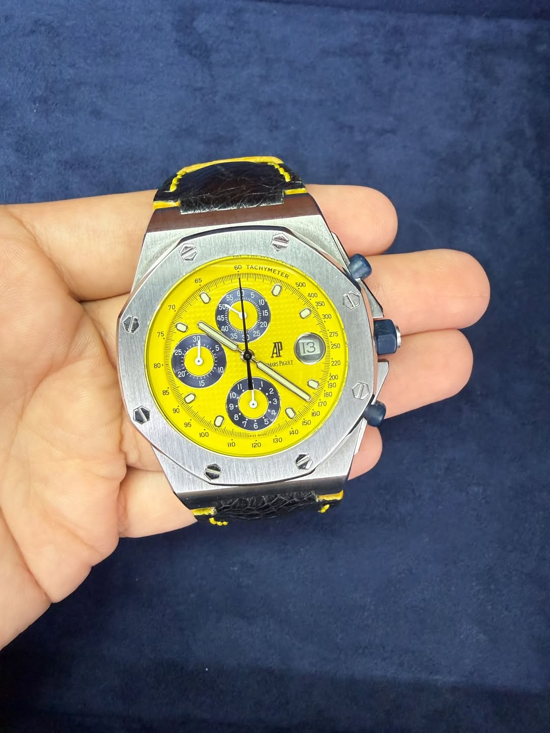May be an image of wrist watch and text