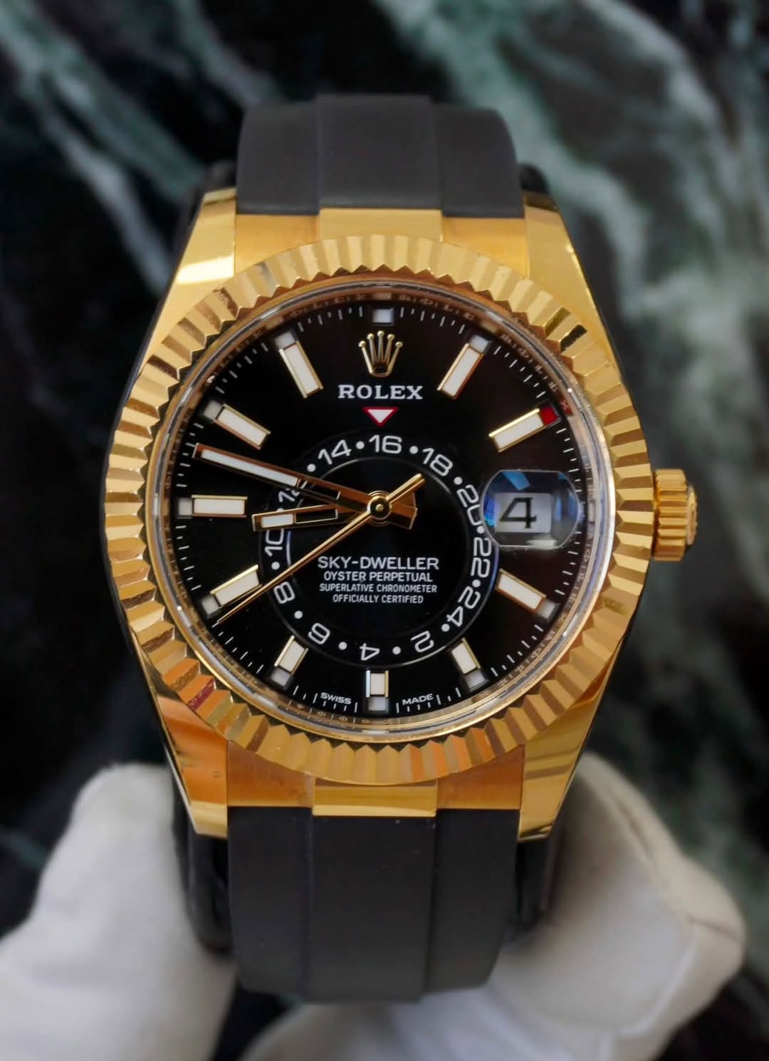 May be an image of wrist watch and text that says 'ROLEX · လ ល N 2 Y · 00 SKY SKY-DWELLER OYSTER অ SUPERLATIVE CUDCANETE CHRONOME ETE OYSTERPERPETUAL OYSTER PERPETUAL AL CIALLY…