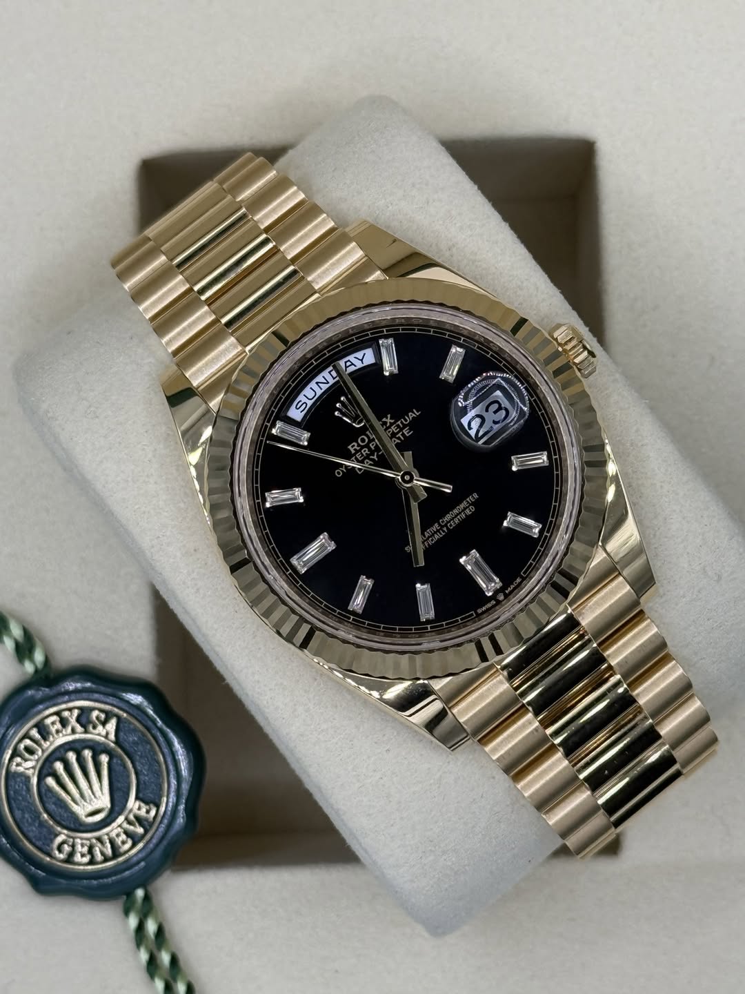 May be an image of wrist watch and text