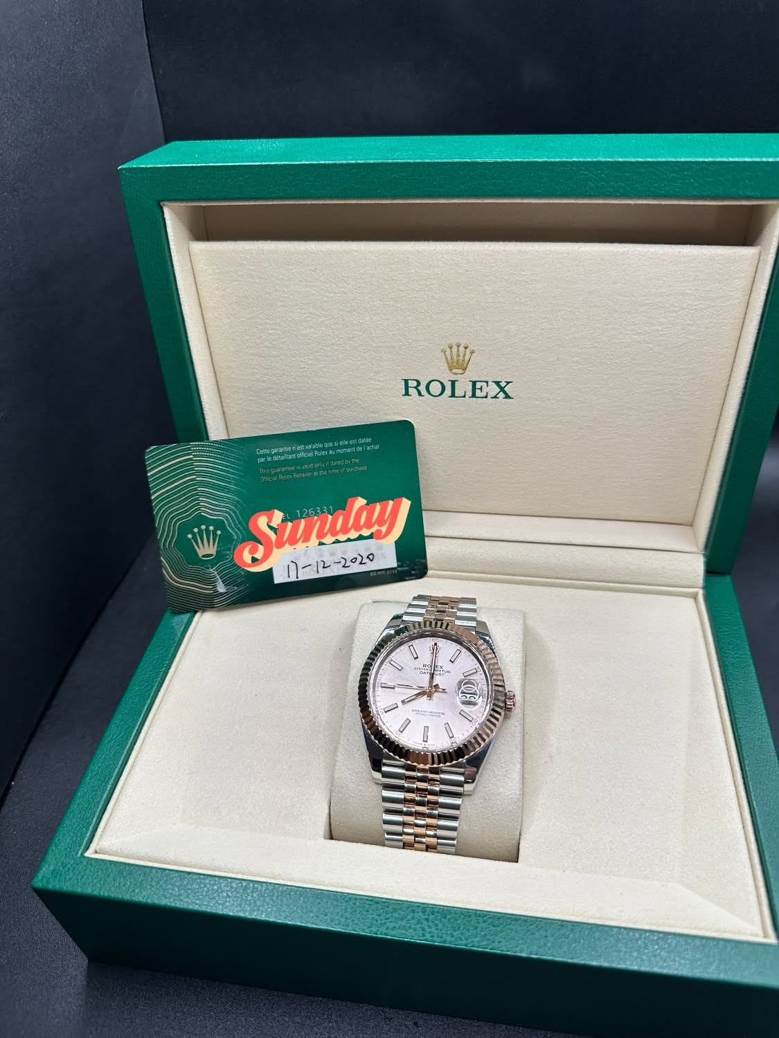 May be an image of wrist watch and text that says 'ROLEX 4E4 nelne/ Sunday '