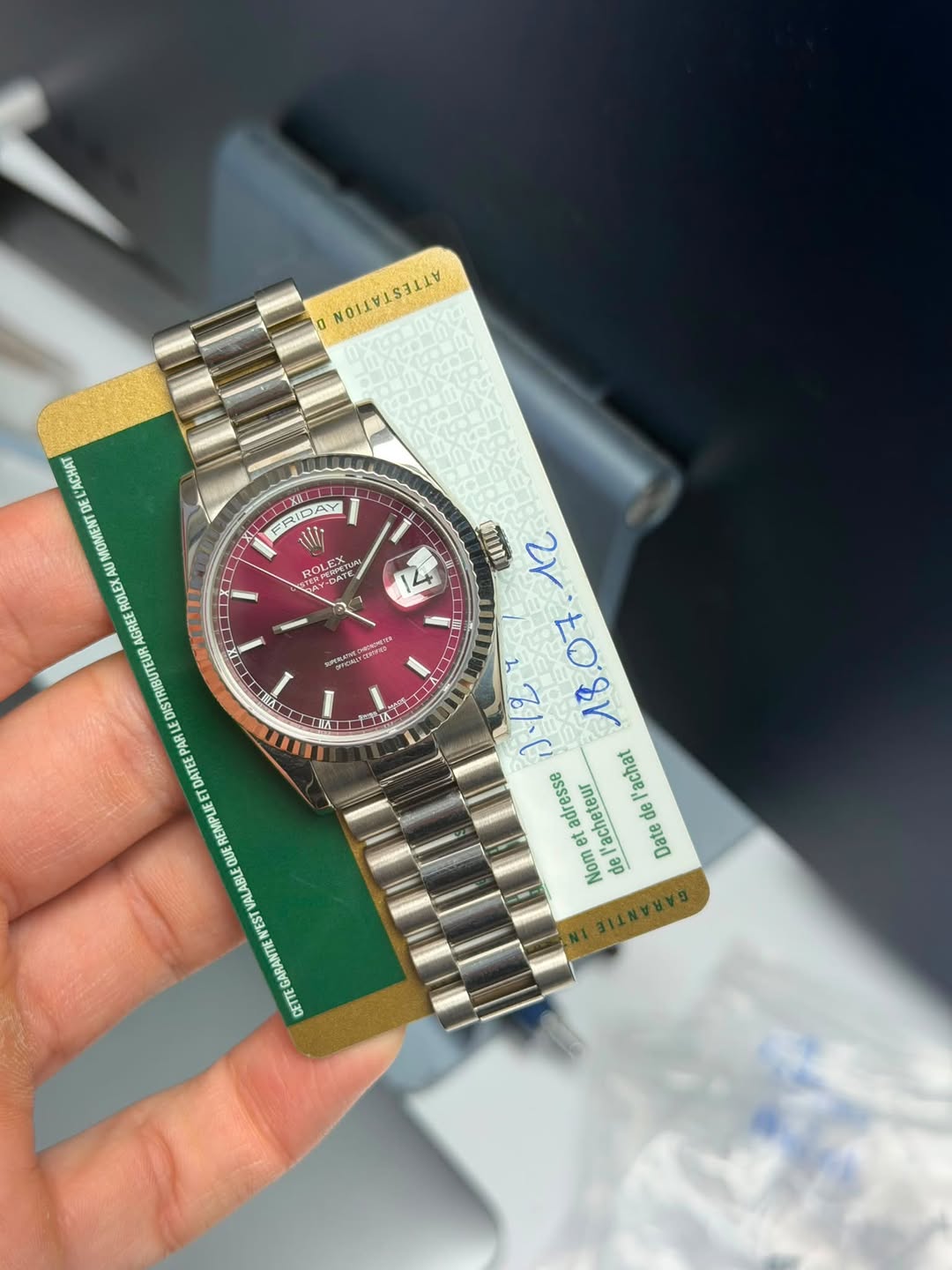 May be an image of wrist watch and text