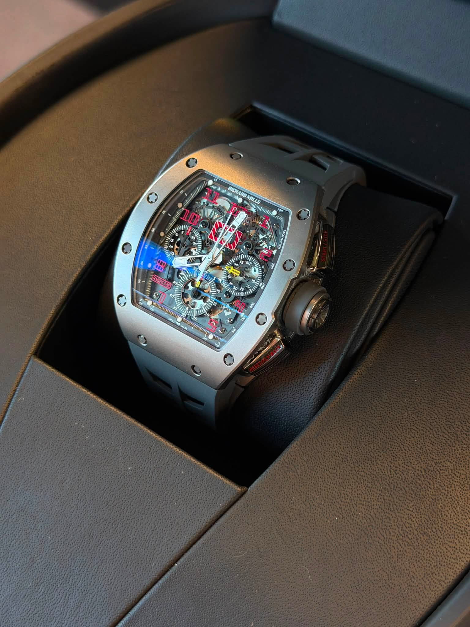 May be an image of wrist watch and text