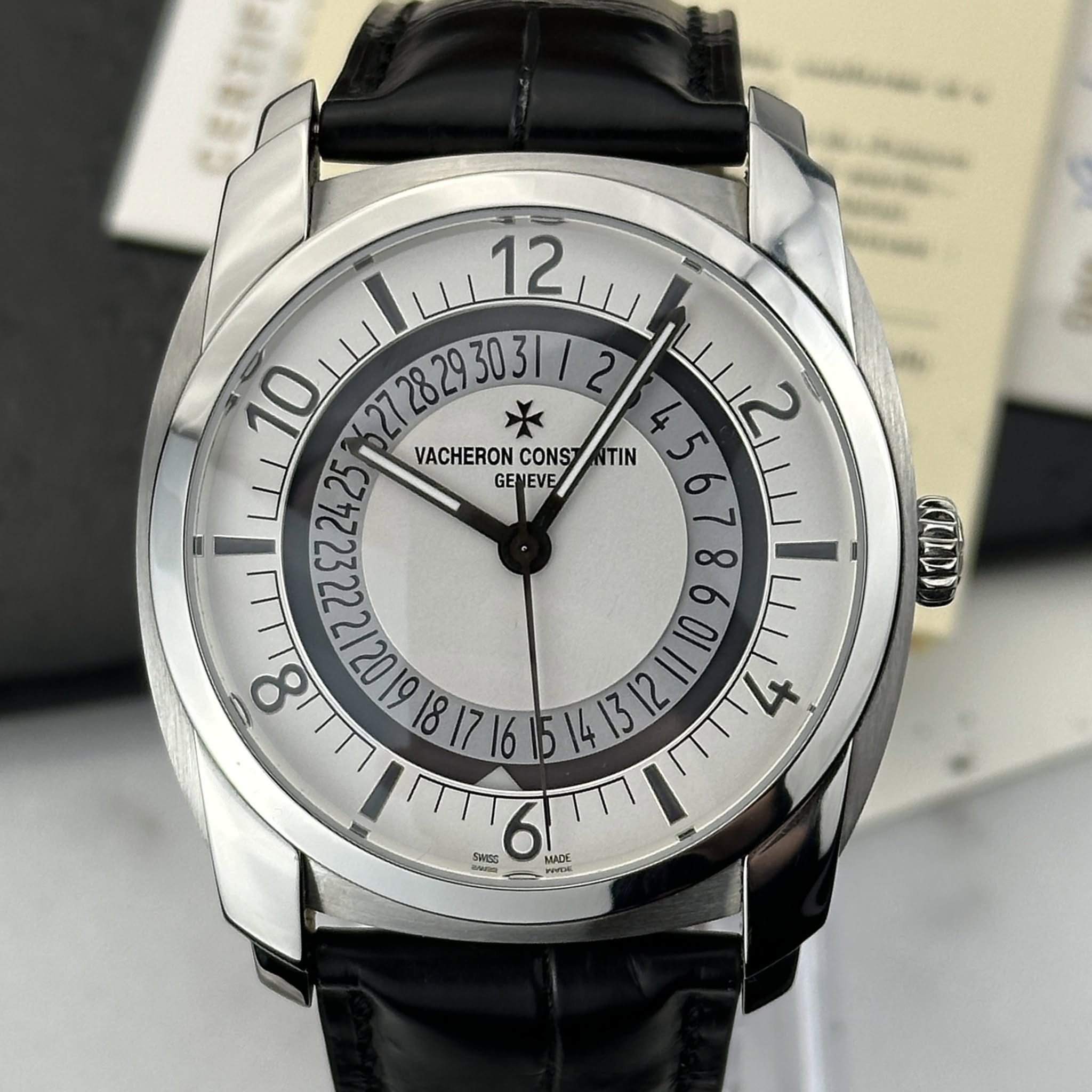 May be an image of wrist watch and text