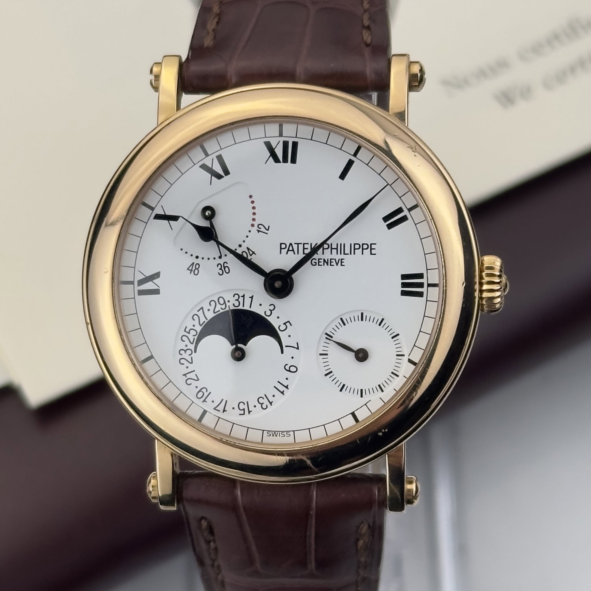 May be an image of wrist watch and text