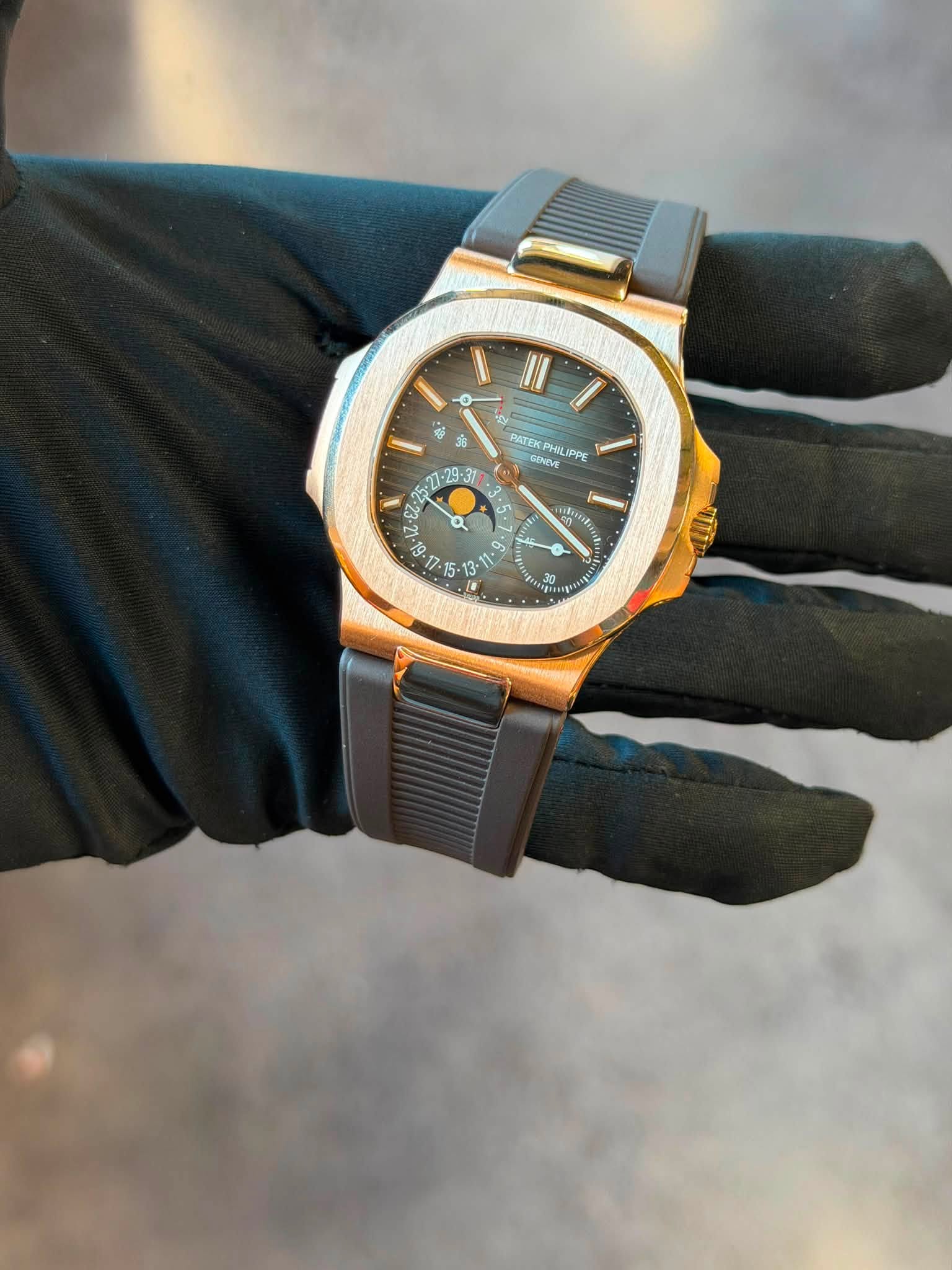 May be an image of wrist watch and text that says 'II PATEЖ PHIL KPH GENEVE HIL IPPE EZ 66- 2 Betes 9 3- ማ 30'