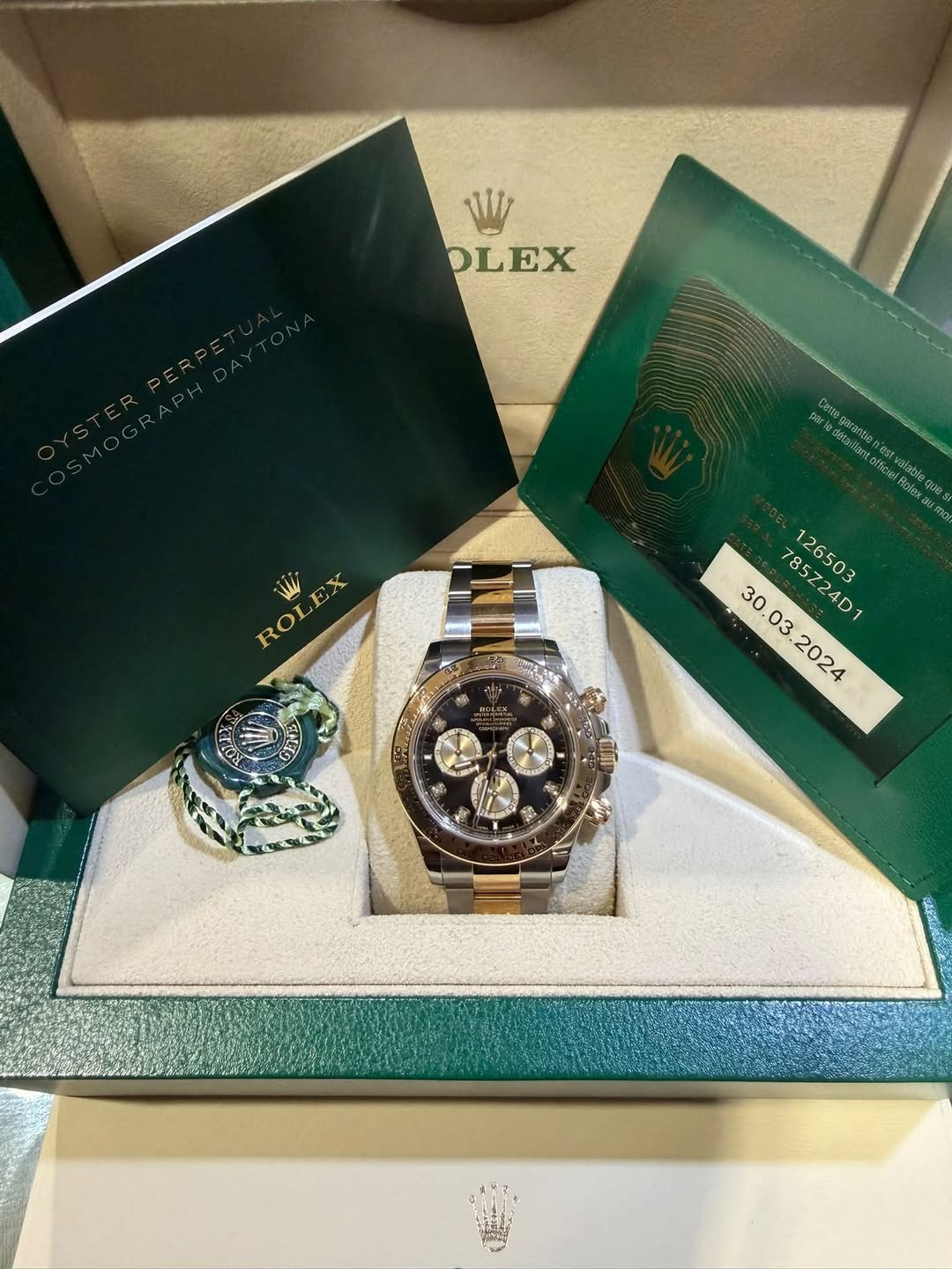 May be an image of wrist watch and text