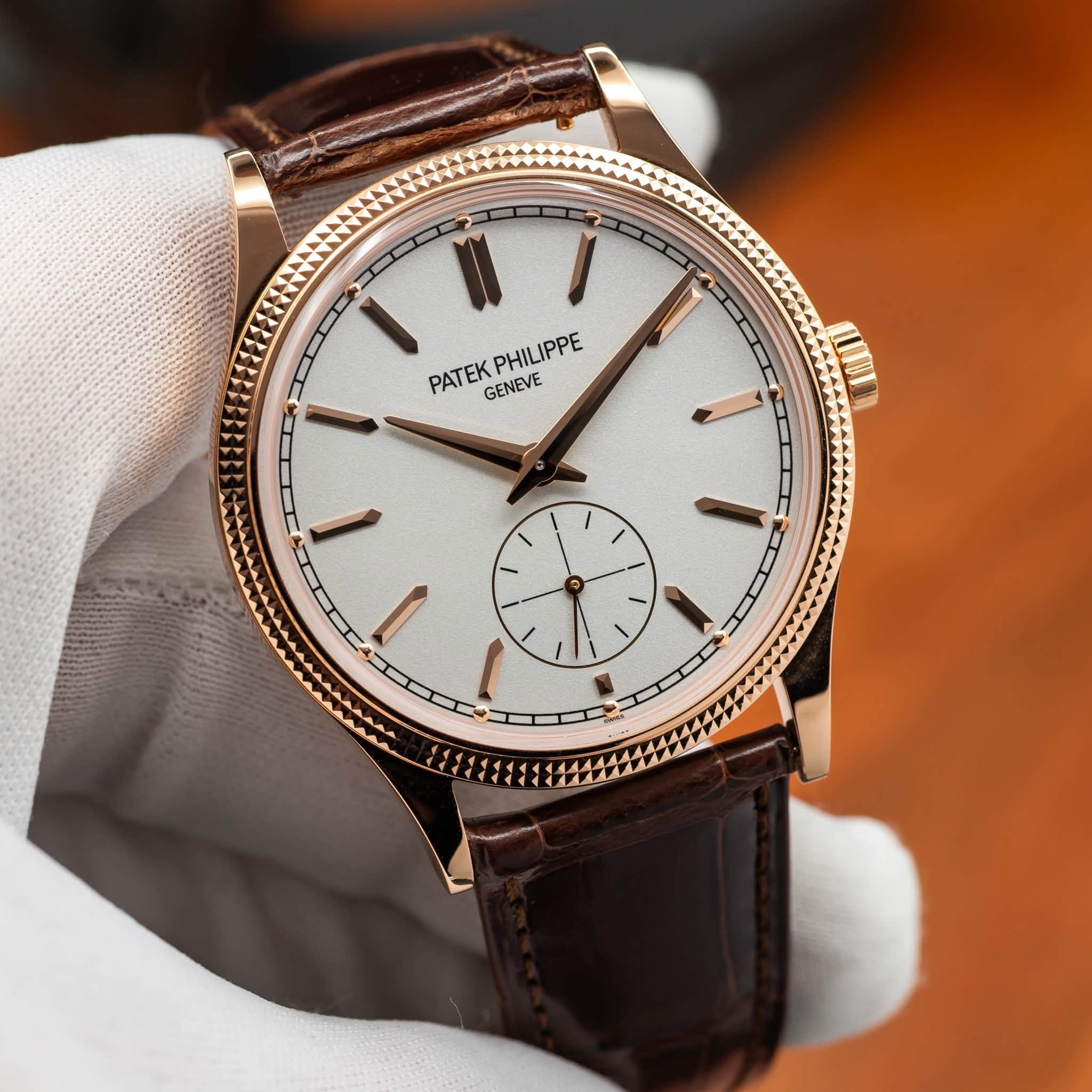 May be an image of wrist watch and text that says 'PHILIPPE PHIL PATEK GENEVE'