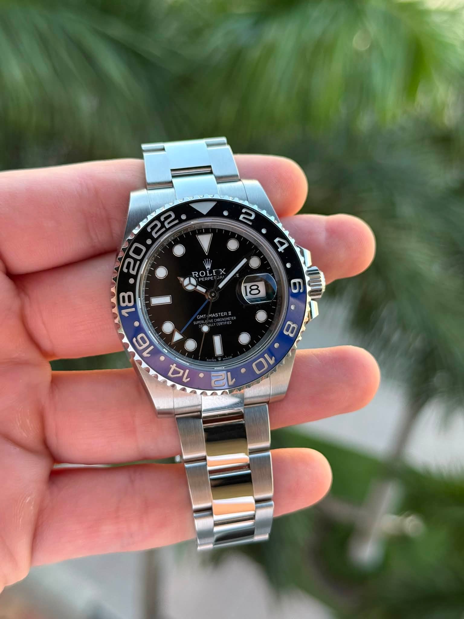 May be an image of wrist watch and text