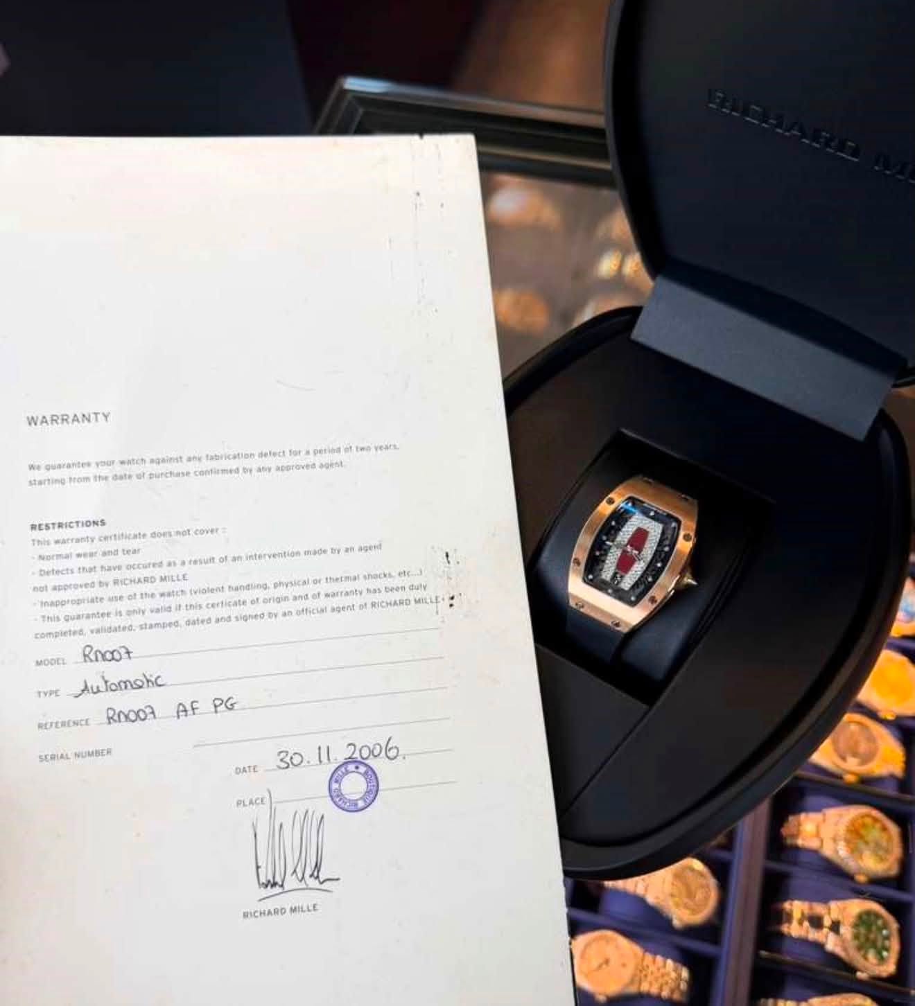 May be an image of wrist watch and text