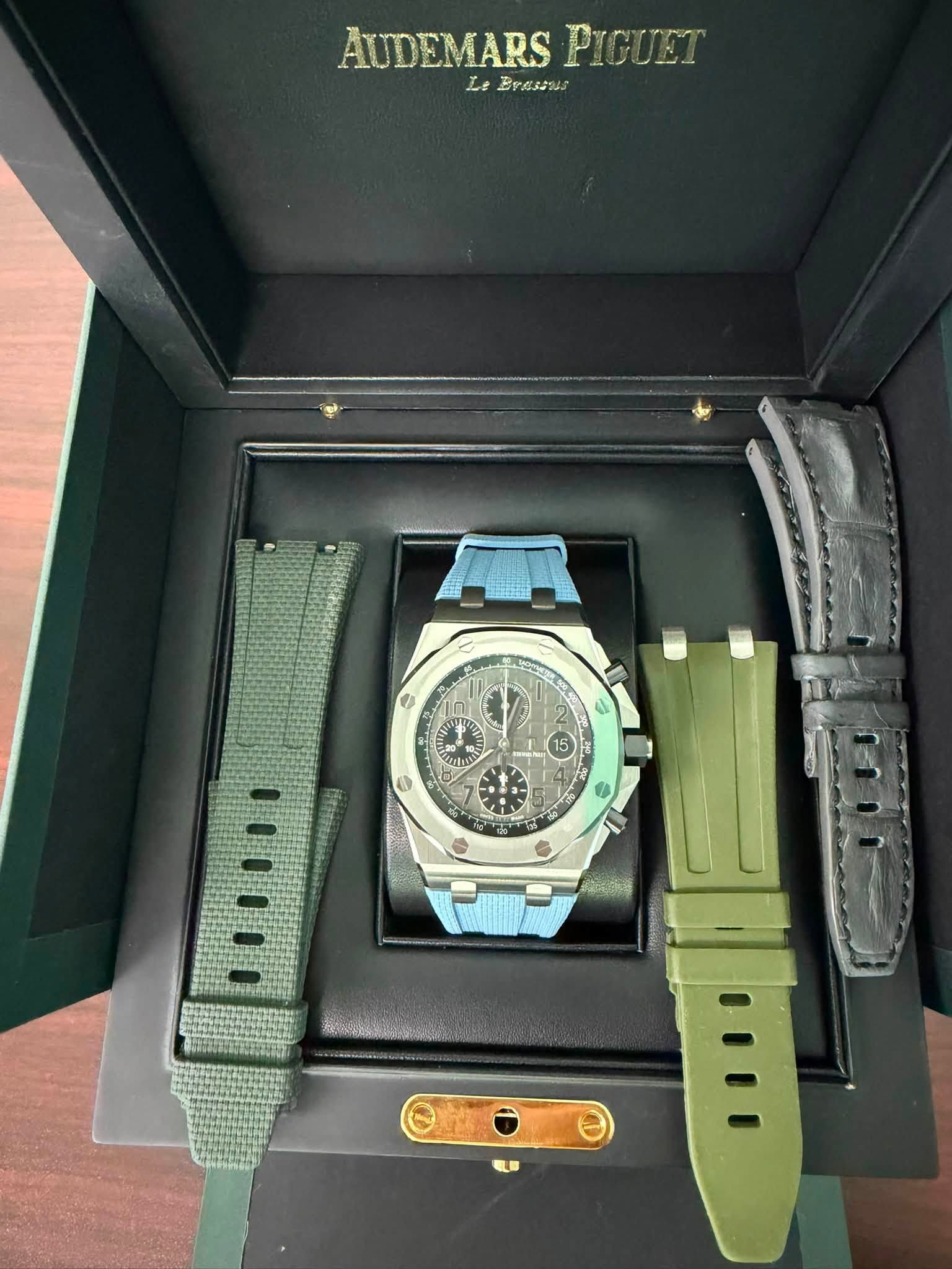 May be an image of wrist watch and text