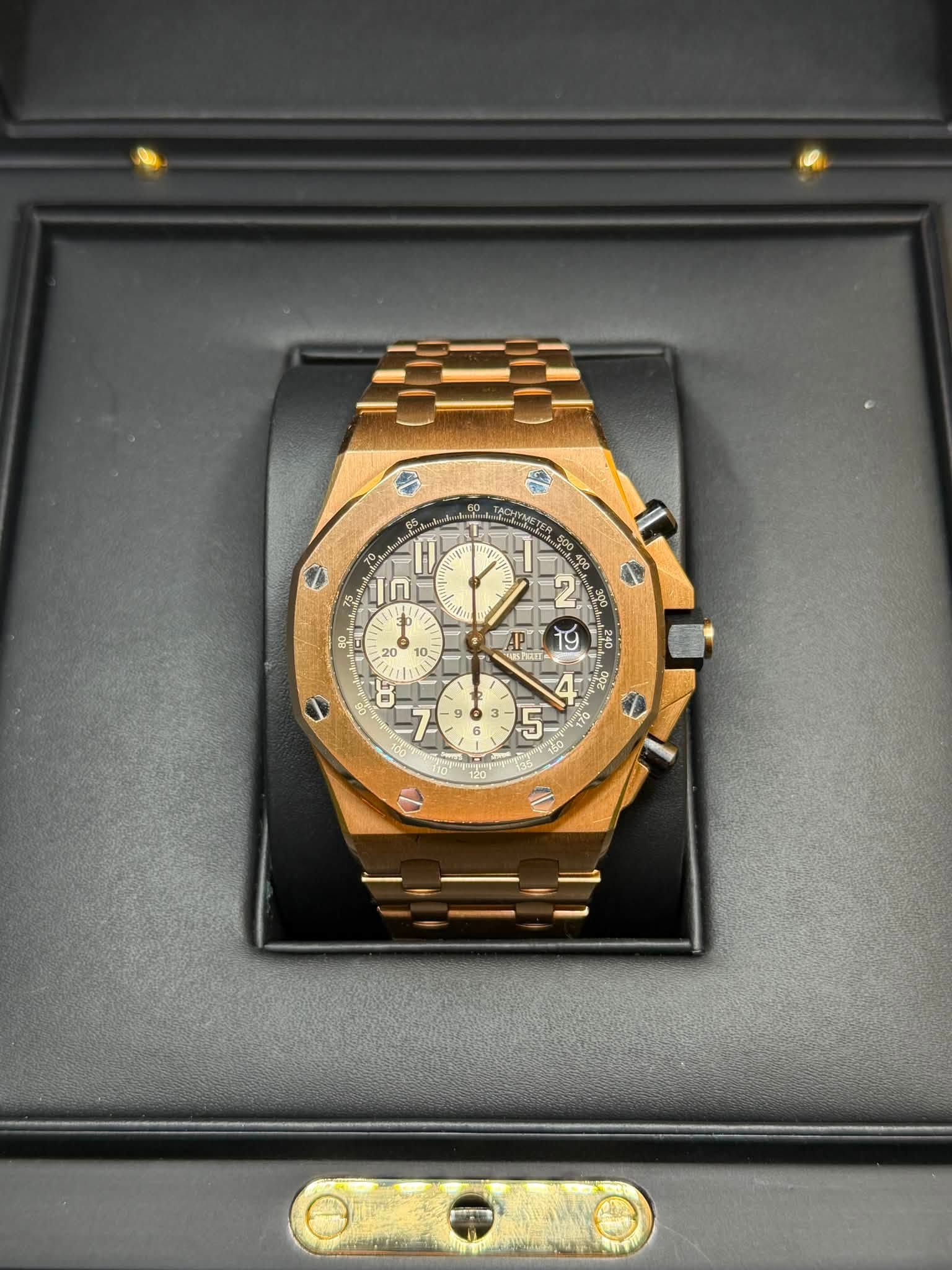 May be an image of wrist watch and text
