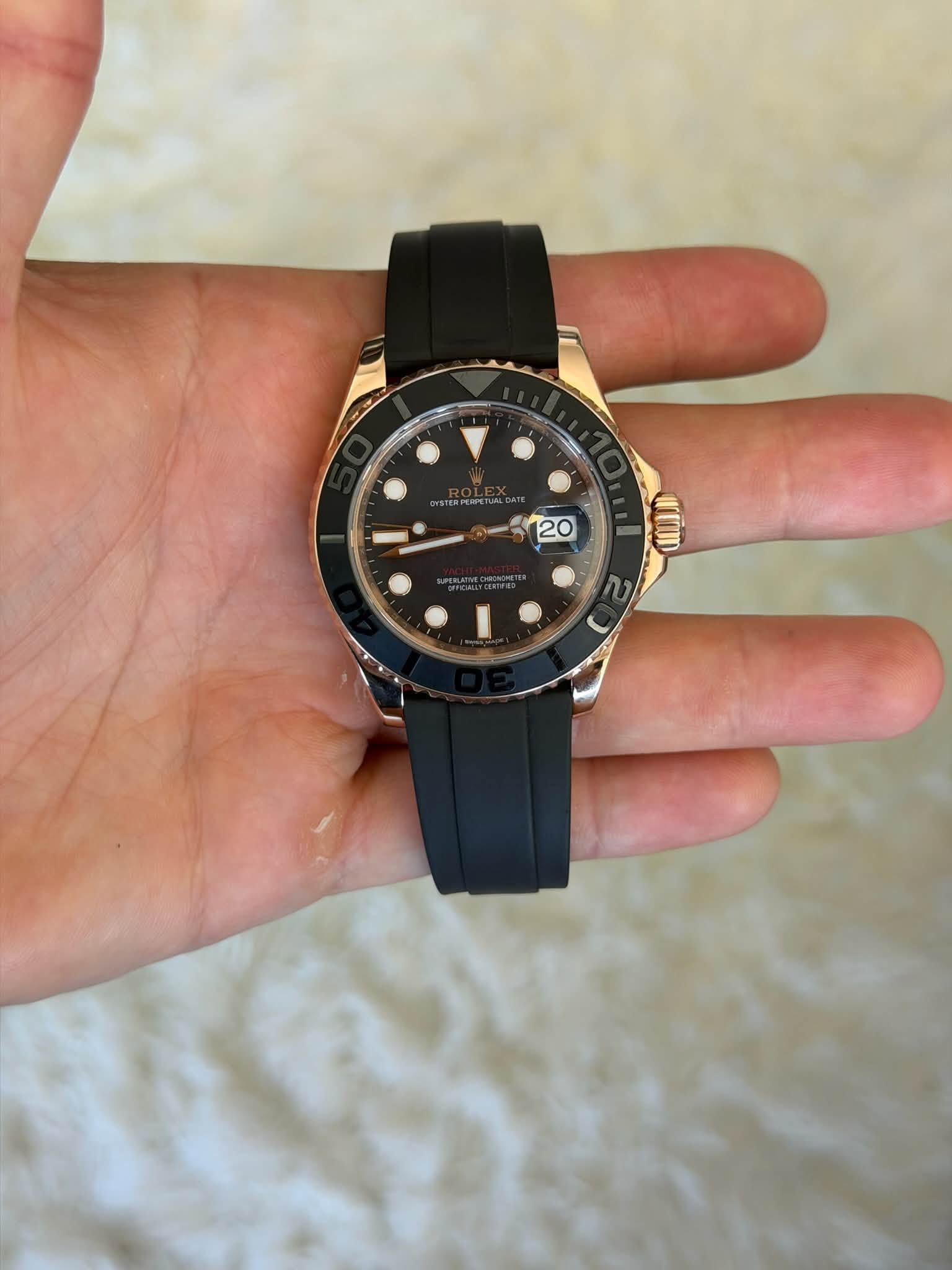 May be an image of wrist watch and text