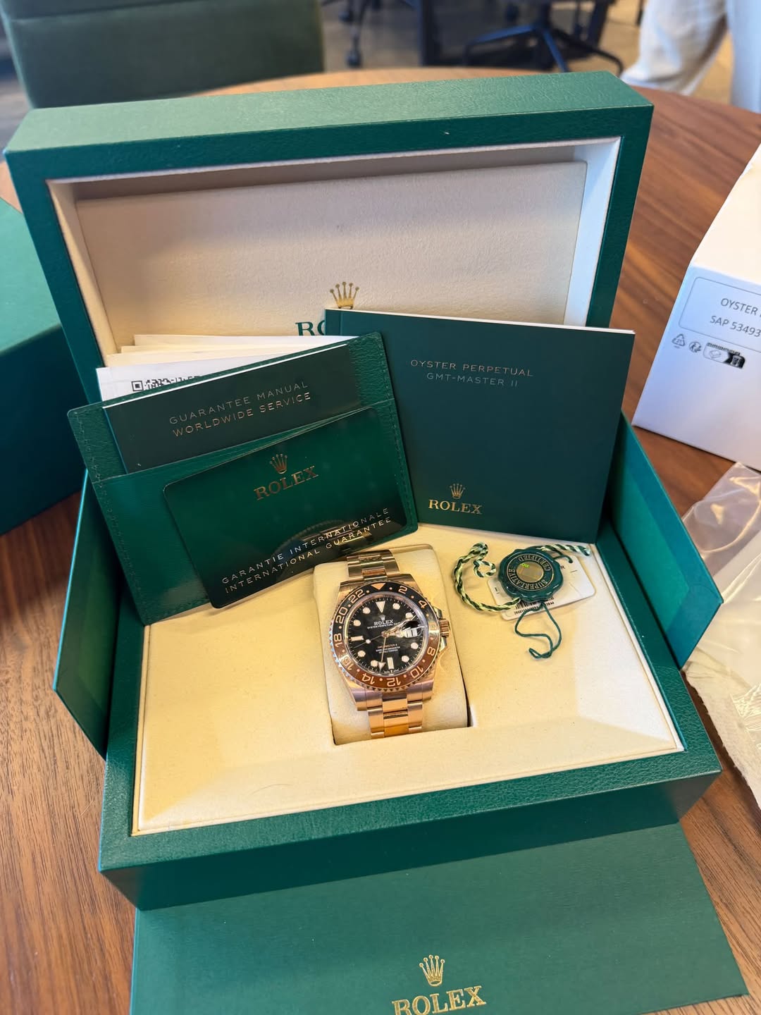 May be an image of wrist watch and text