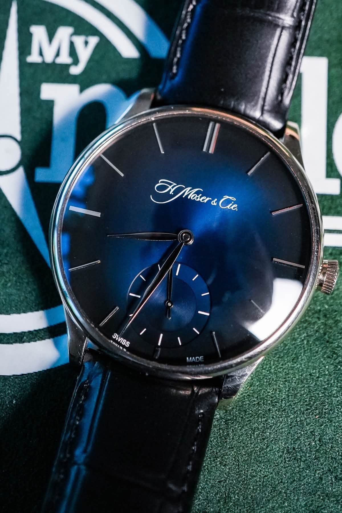 May be an image of wrist watch and text