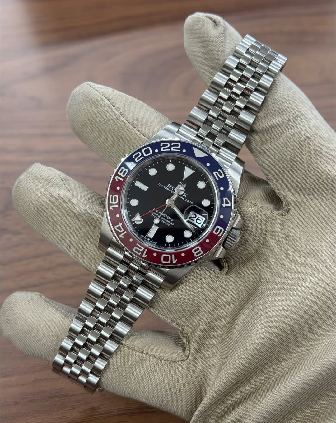 May be an image of wrist watch and text