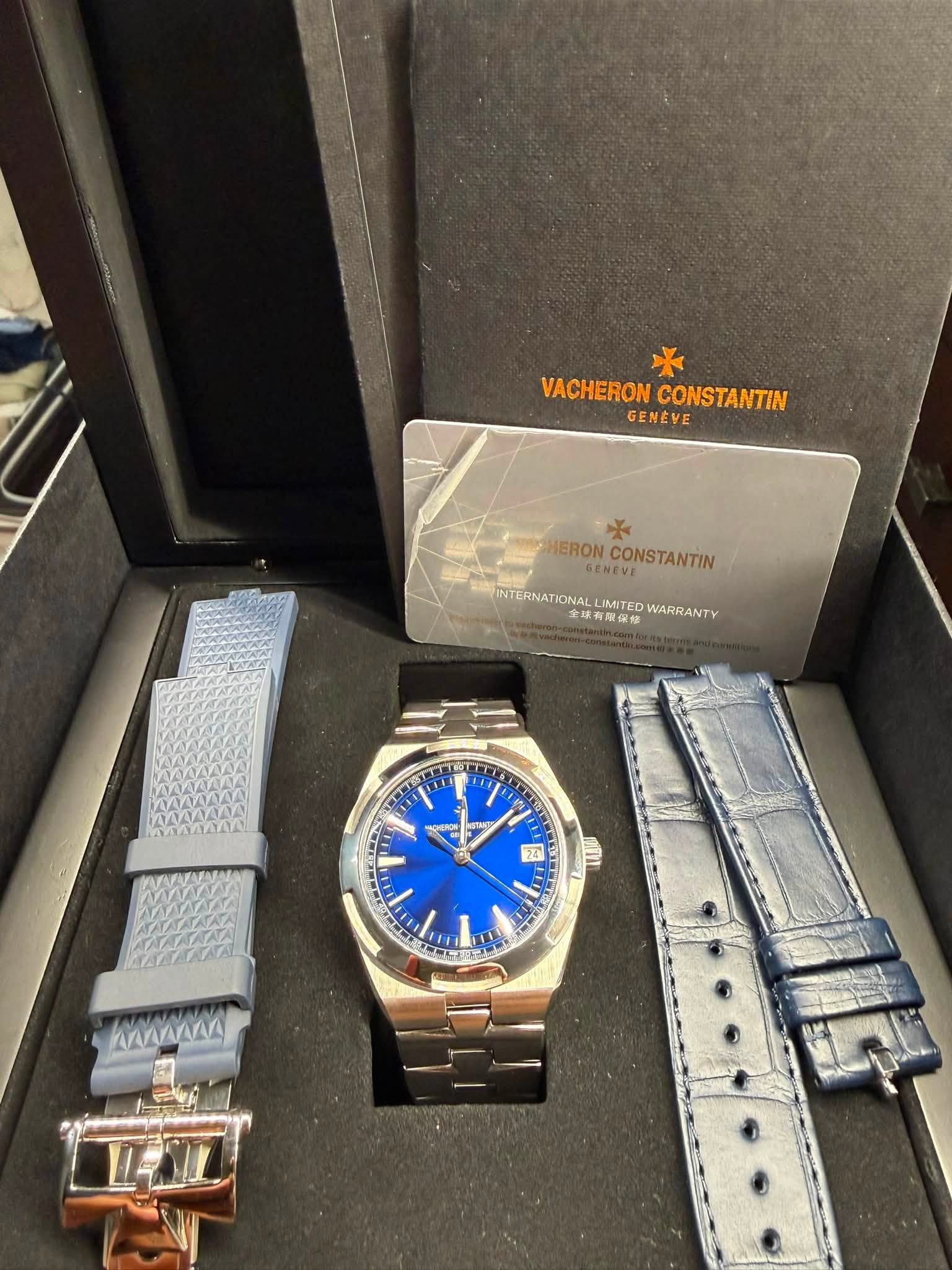 May be an image of wrist watch and text that says 'VACHERON VACHERONCONSTANTIN CONSTANTIN GENEVE HERON.CONSTANTIN HERON GENEVE CONSTANTIN INTERNATIONAL INTERMNATIONALLIMTEDWARRAVTY…