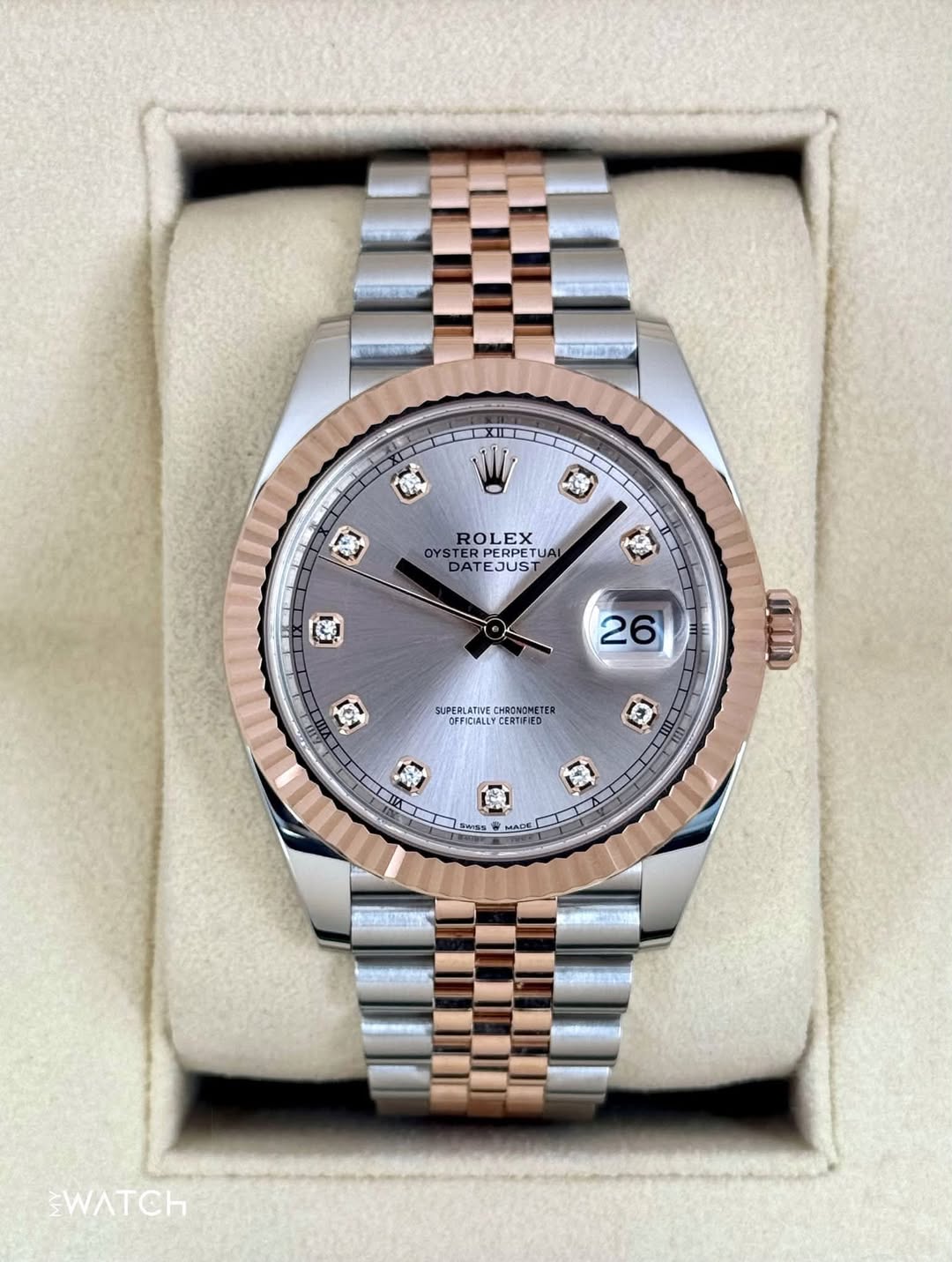 May be an image of wrist watch and text