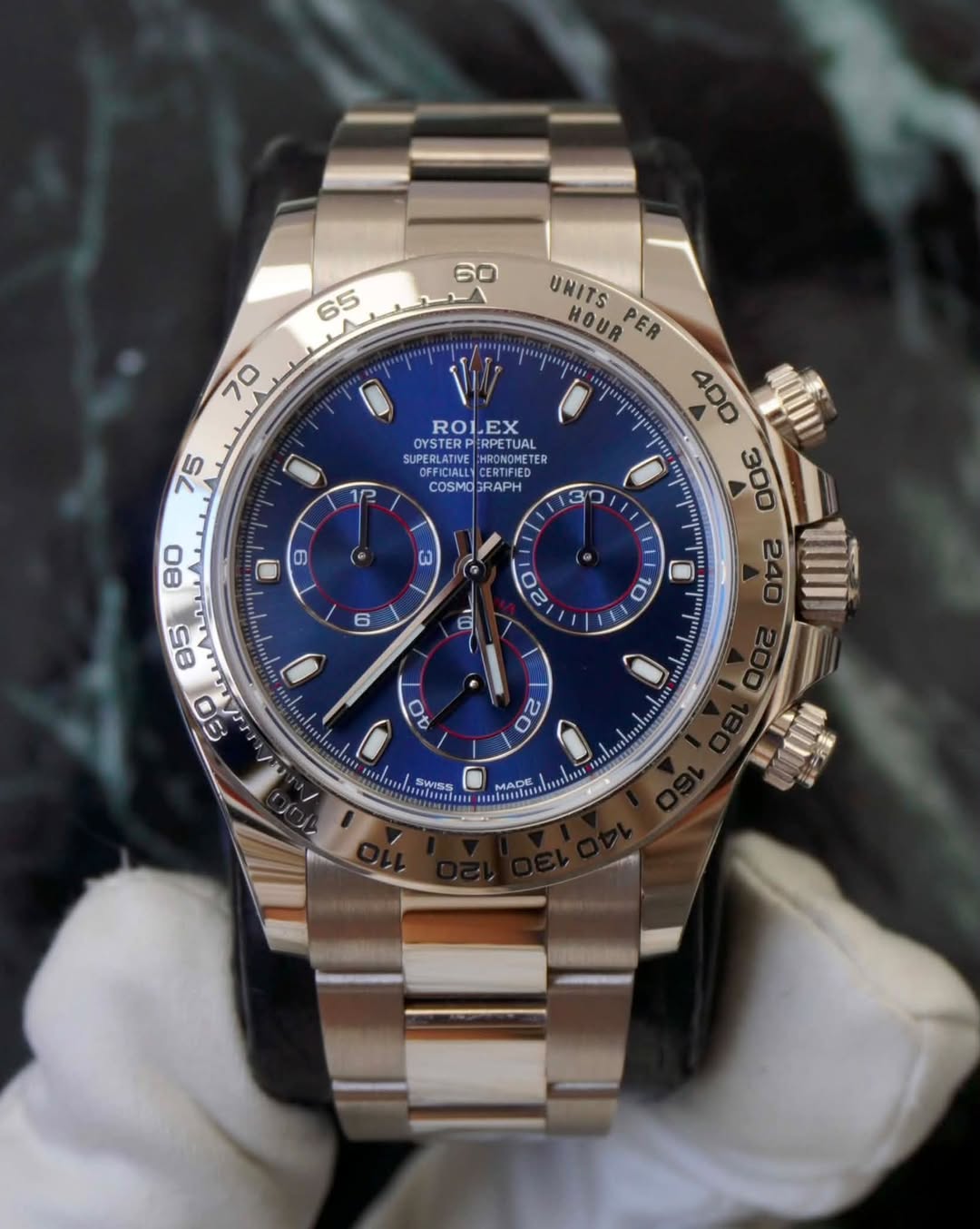 May be an image of wrist watch and text that says '60 65 ٨ حد 70 75 UNITS HOUR PER jeRa ROLEX OYSTERP RPETAL OFFICIALL CERTIFIED HIONORETER COSMO3RAPH BRAPH COSMO 2 3 ® ผ ® 6 80…