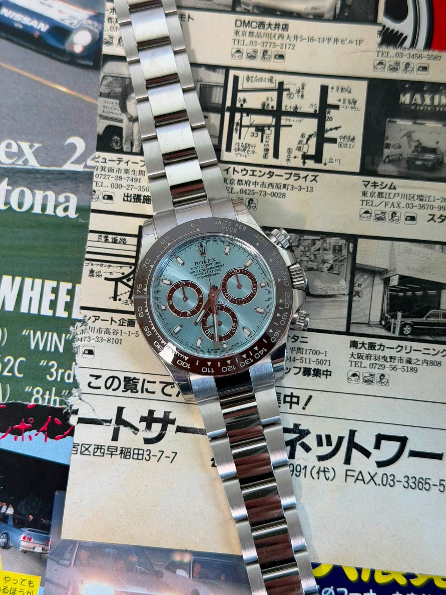 May be an image of wrist watch and text