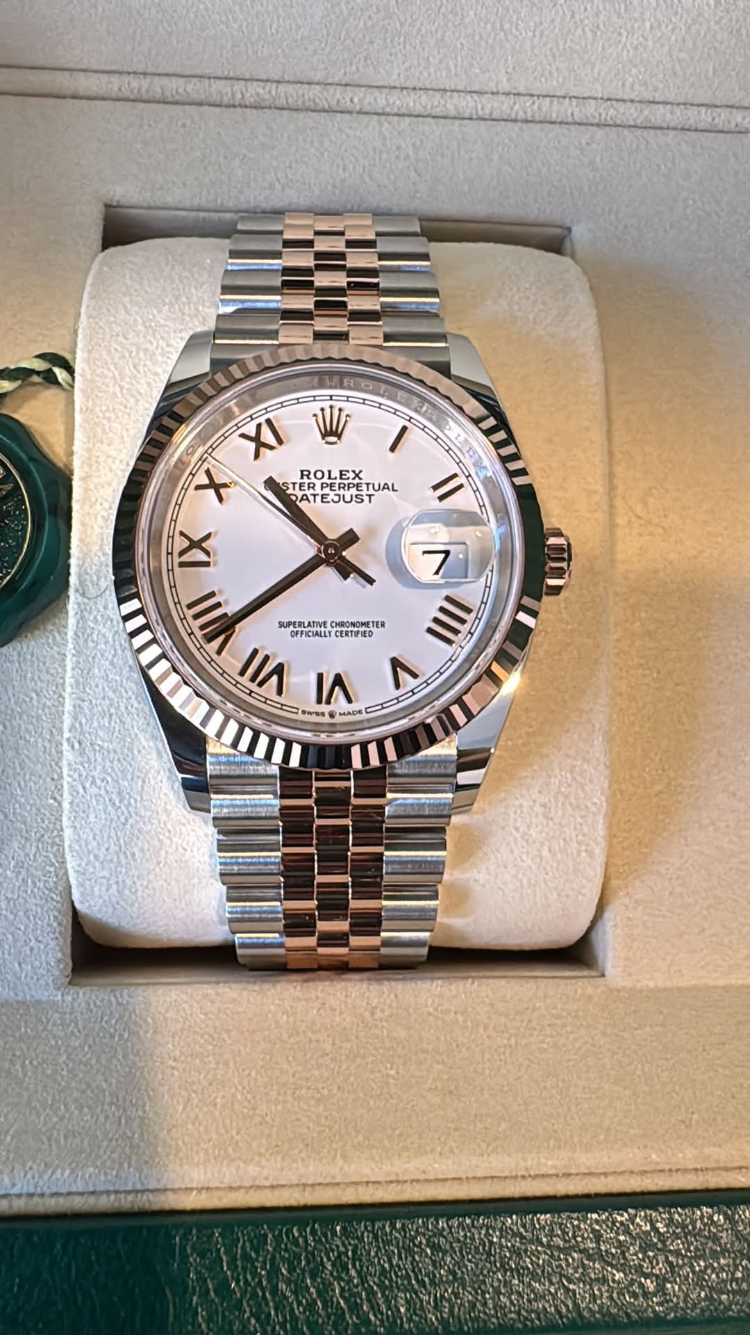 May be an image of wrist watch and text