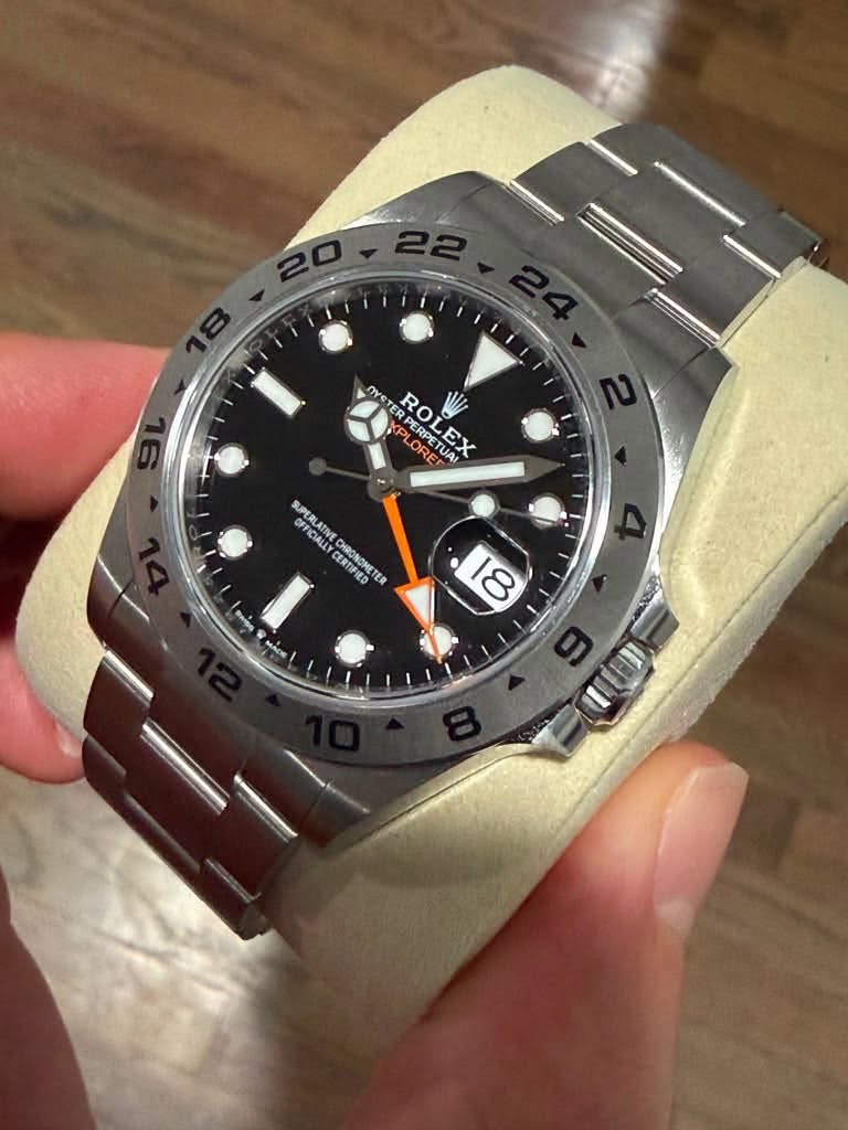 May be an image of wrist watch and text