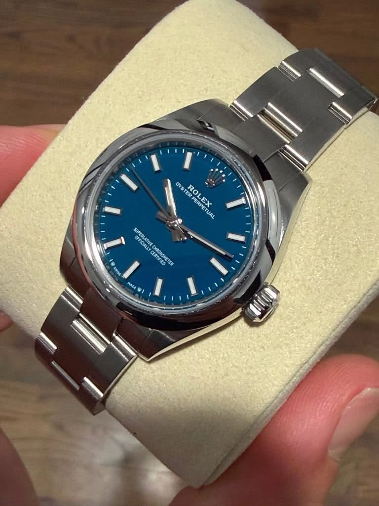 May be an image of wrist watch and text that says 'OYS STER ROLEX PEEY LEY OSROLEX CX ER RO.. Ro RPERPE pe UAL SUPERLATIVE ICIALLY CERTIGME CHRONONETER TER OFFICIALLY…