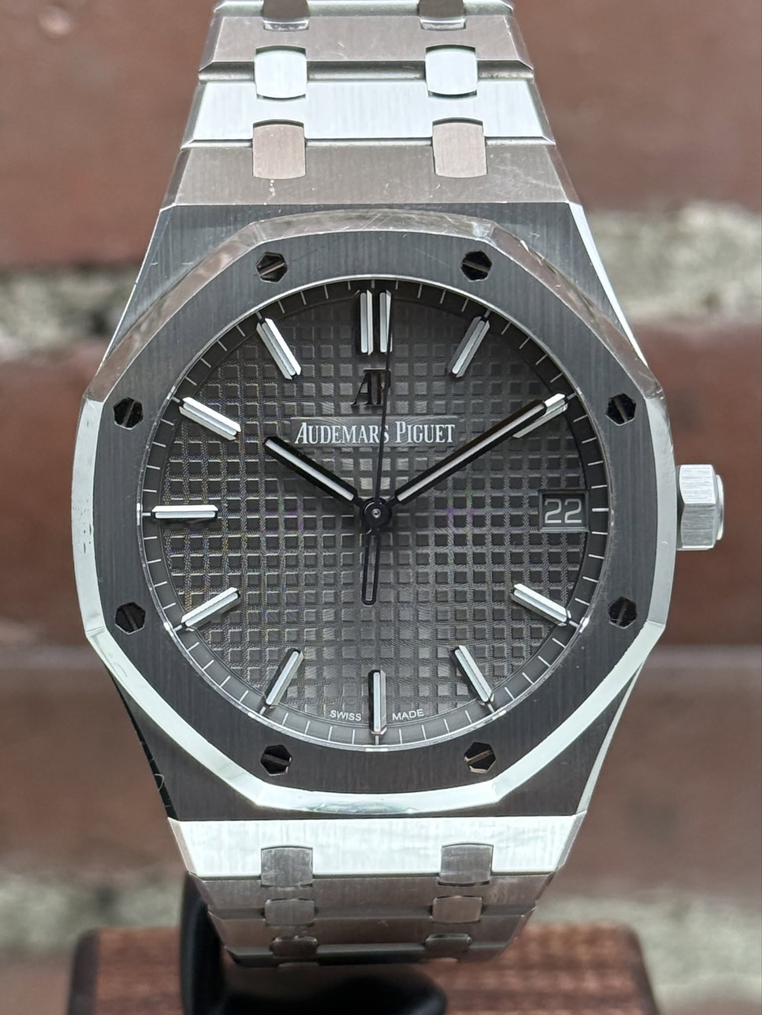 May be an image of wrist watch and text