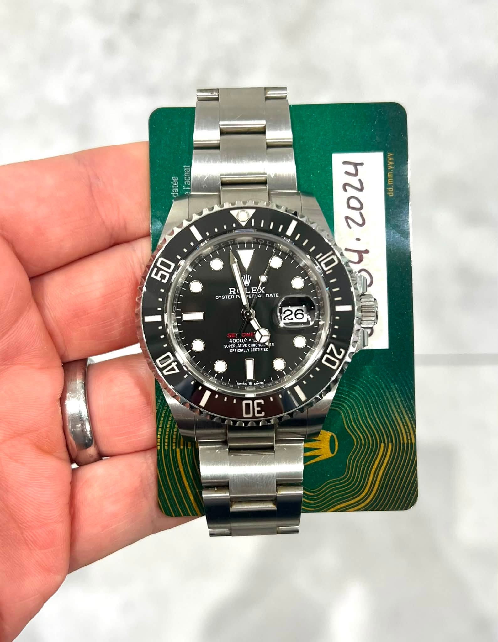 May be an image of wrist watch and text that says 'datée AeuoE 50 R OYSTER OYSTE 4000f CFCALYCERFEE ከ202 Kллawwepp 10 ኮድ ከ202.አዲበ ለድመ መ h F EX ATE TALDATE E I 26 20 pada y 30 = AO…
