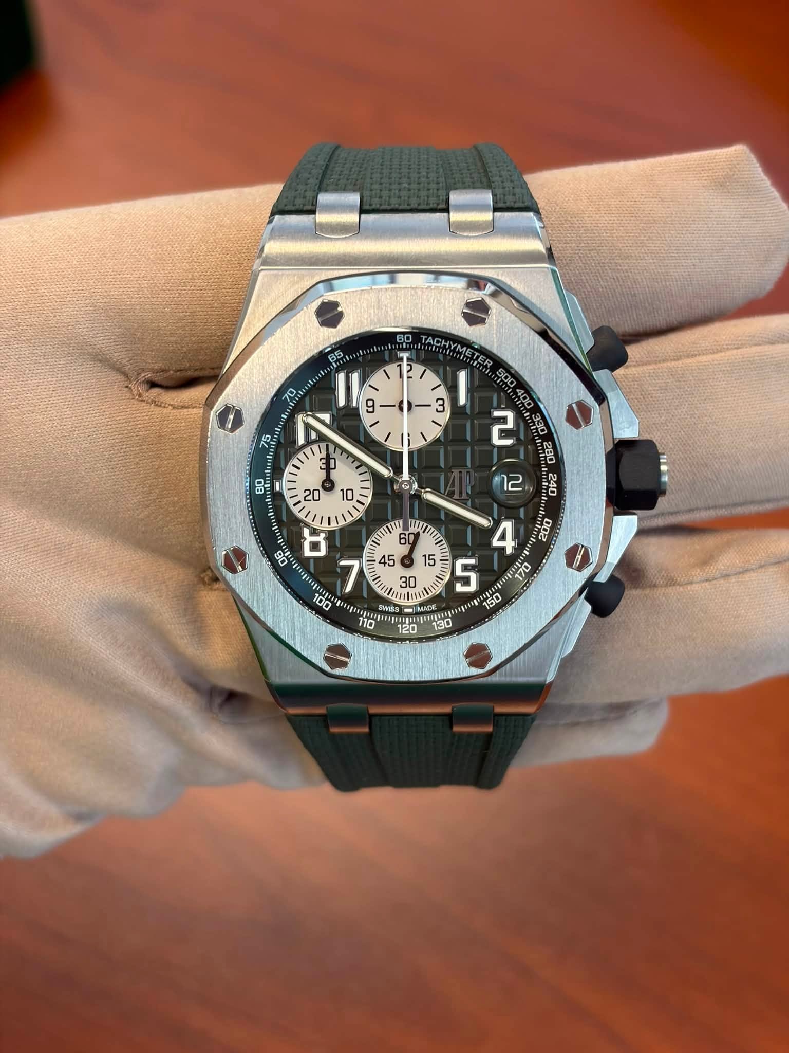 May be an image of wrist watch and text