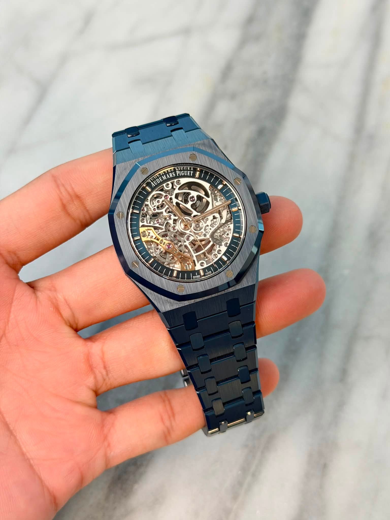 May be an image of wrist watch and text