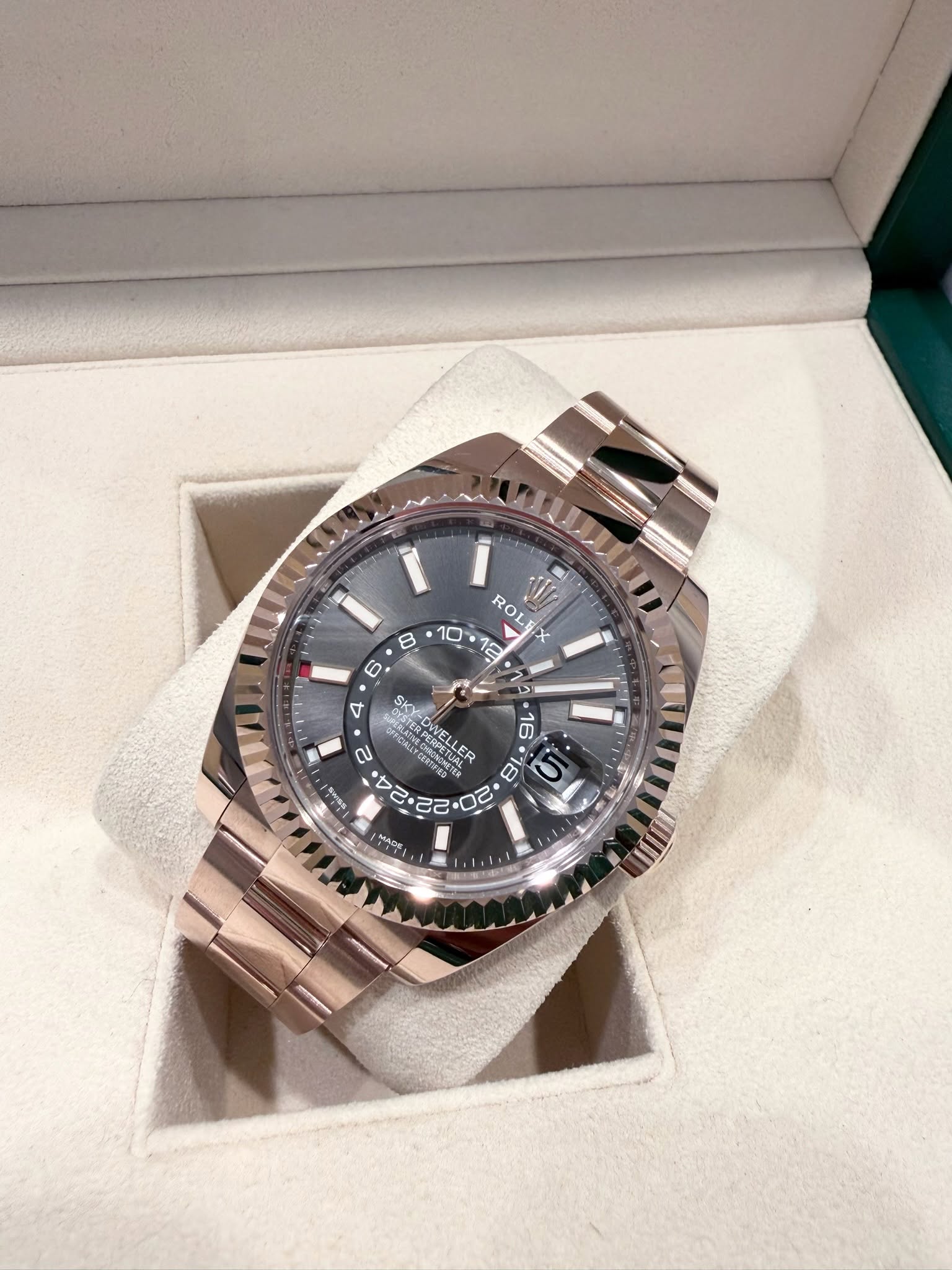May be an image of wrist watch and text