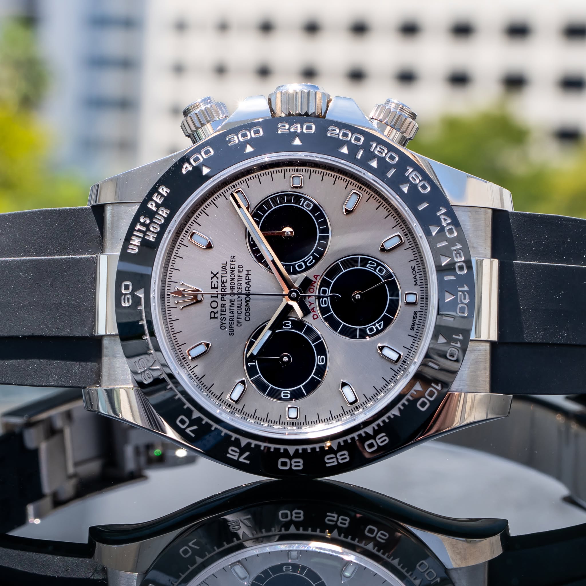 May be an image of wrist watch and text