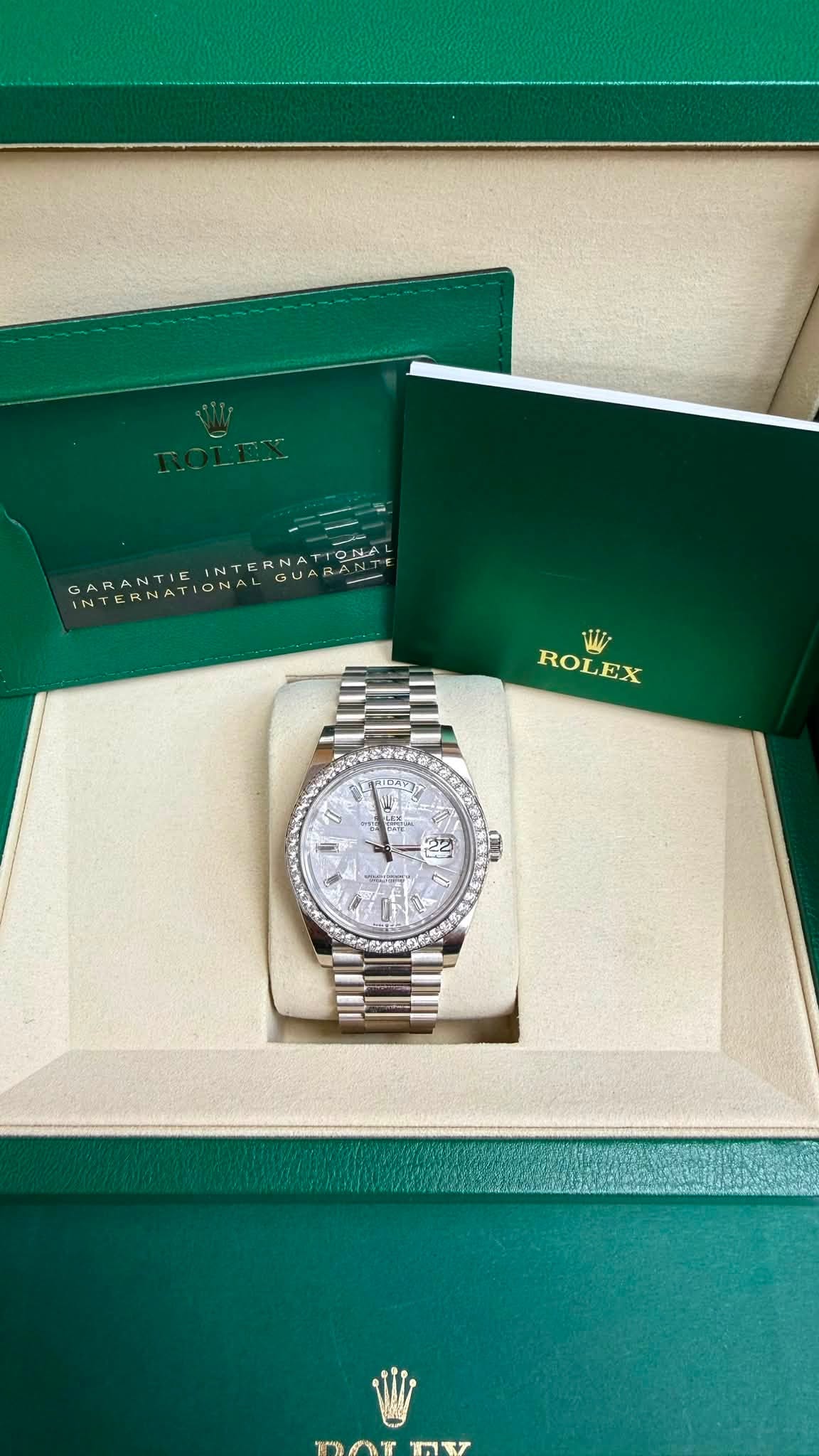 May be an image of wrist watch and text